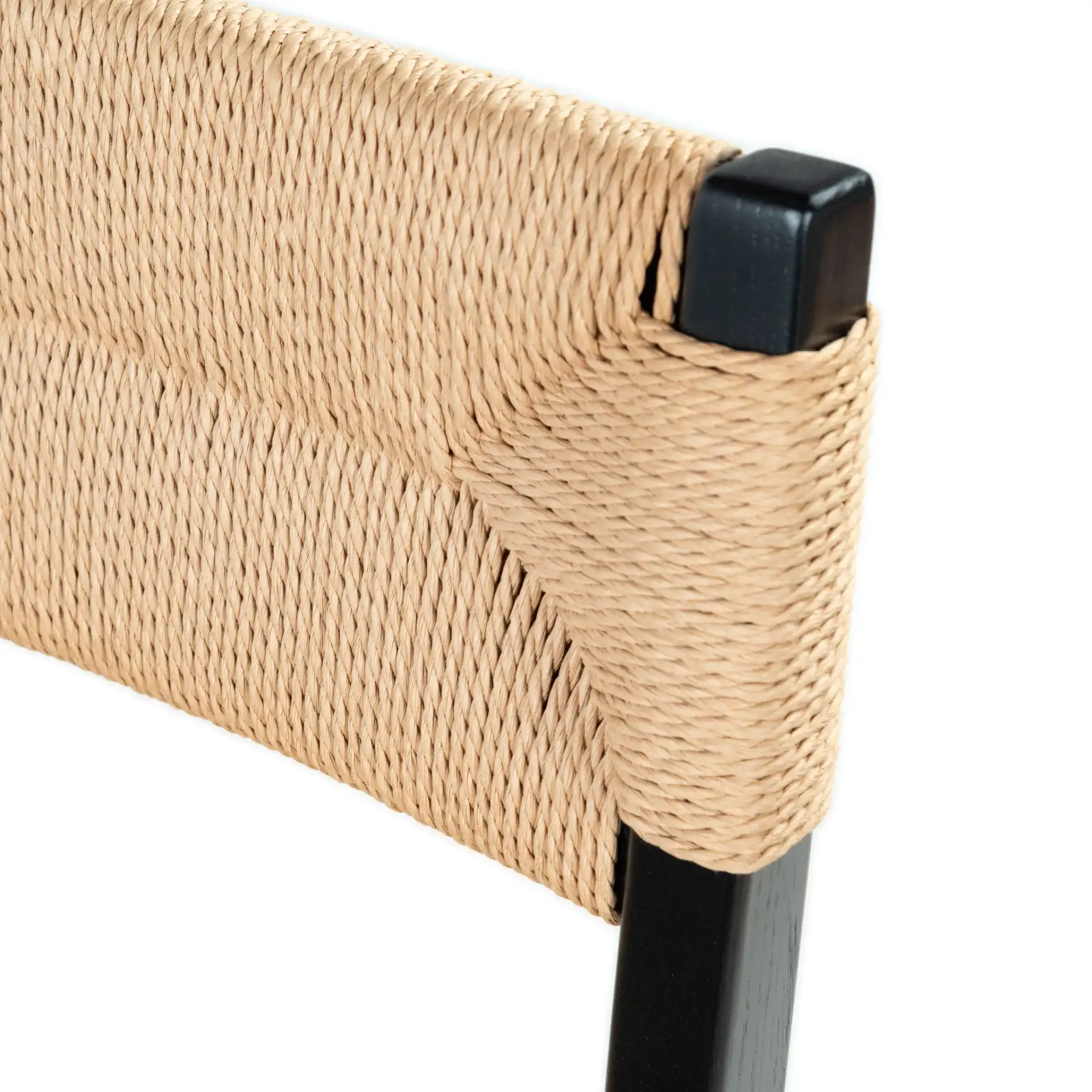 Cody Rattan Counter Stool in Black / Natural in a styled room