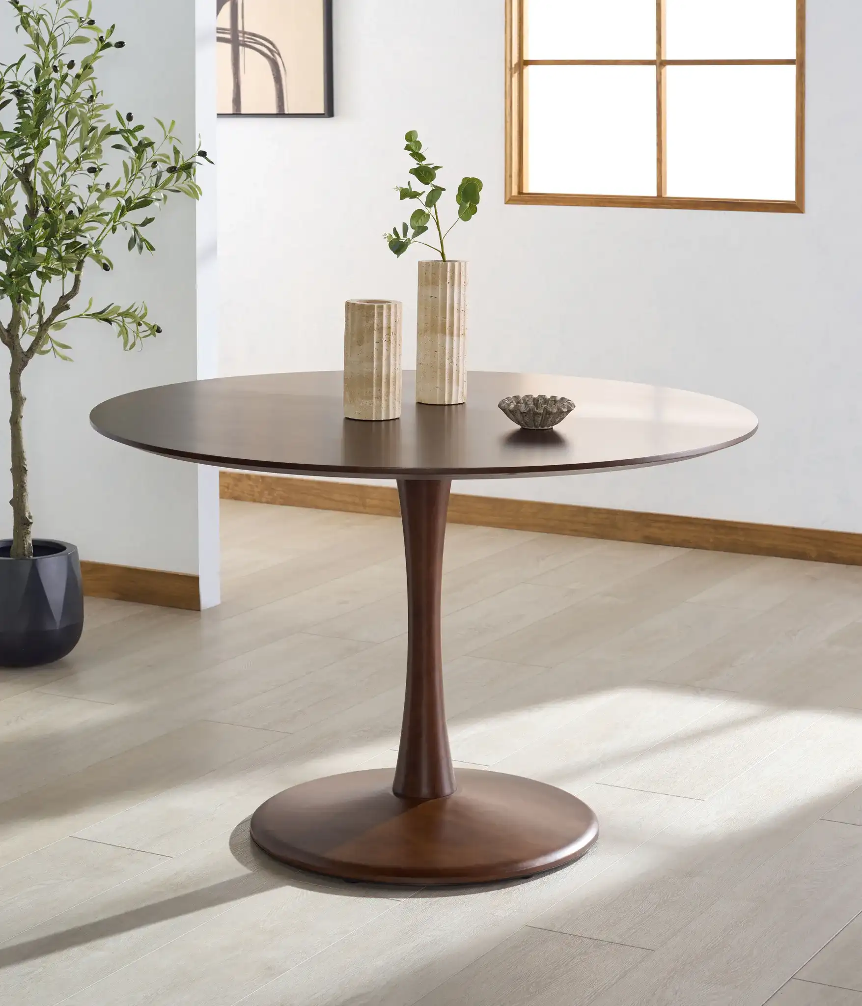 Lisette Round Dining Table in Walnut in a styled room
