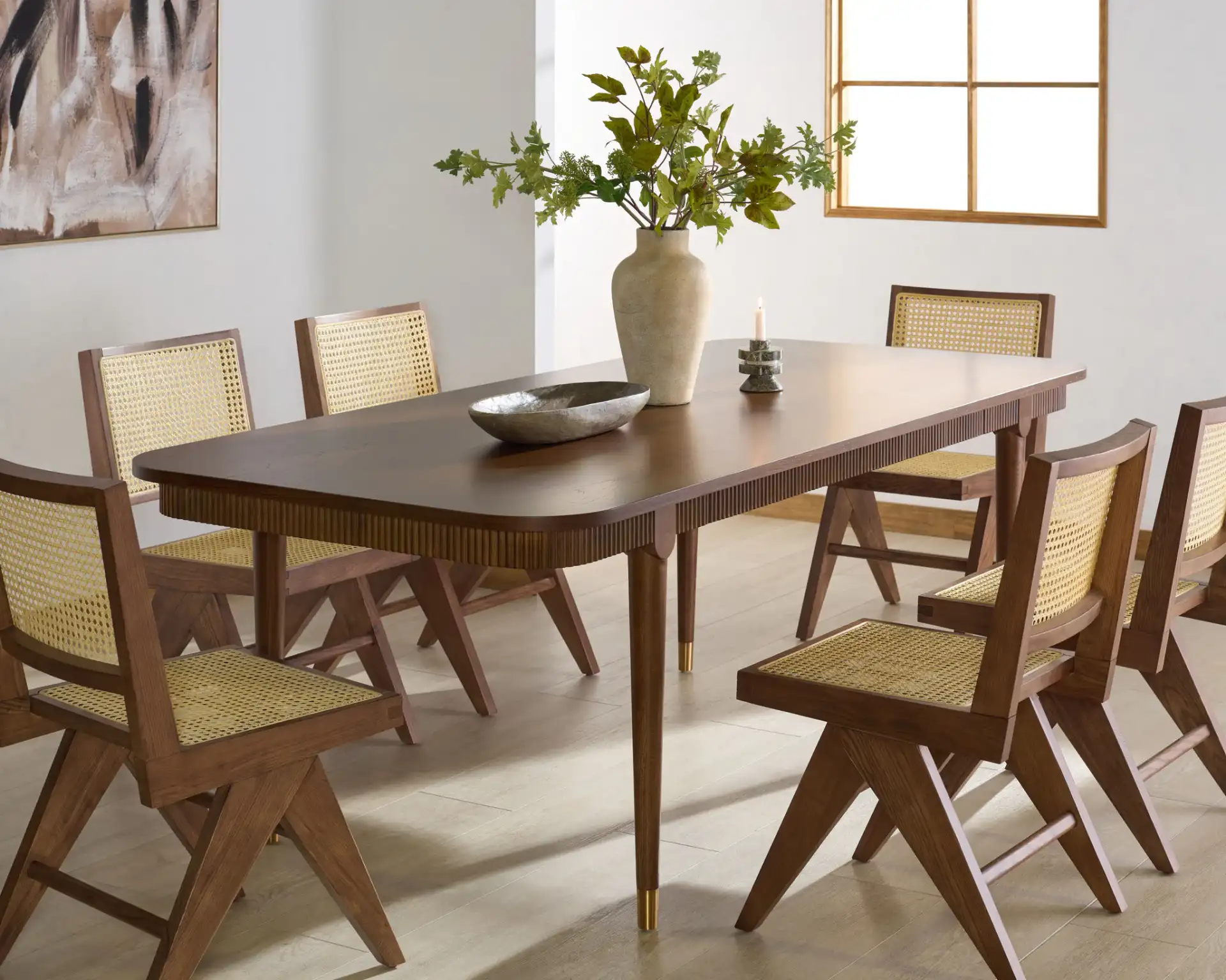 Kaylenne 90" Dining Table in Walnut / Brass in a styled room