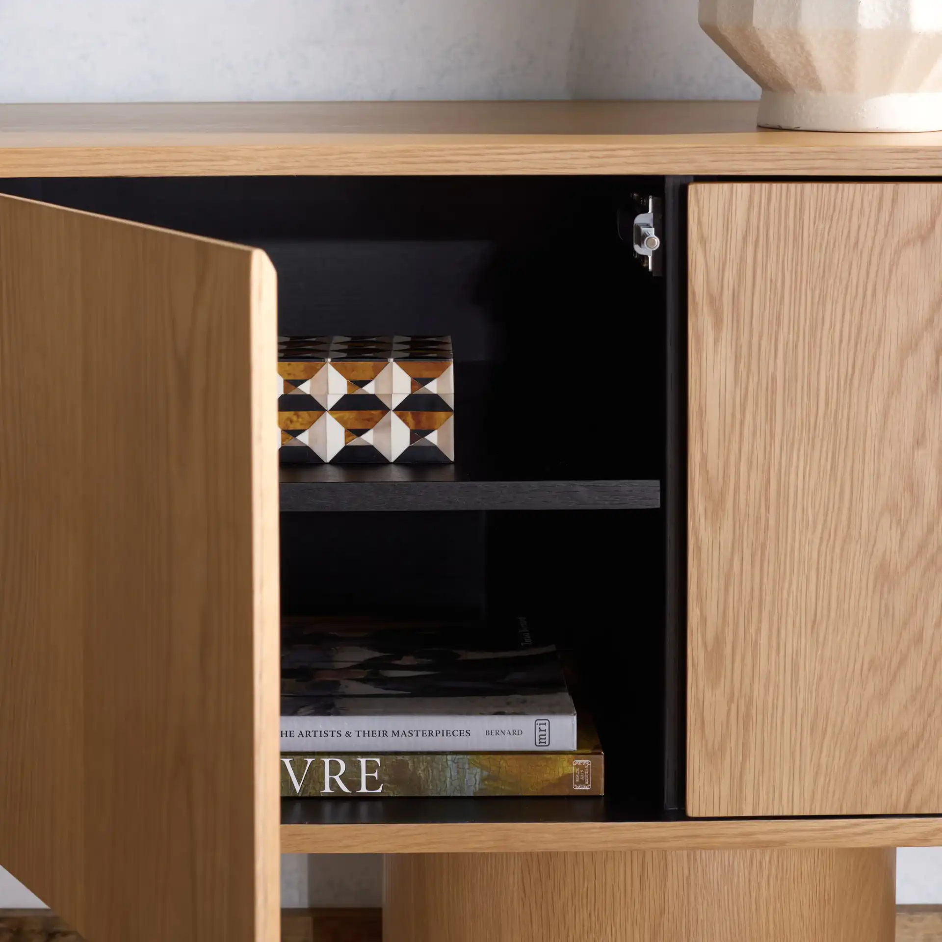 Alberti Wood Sideboard in Natural in a styled room