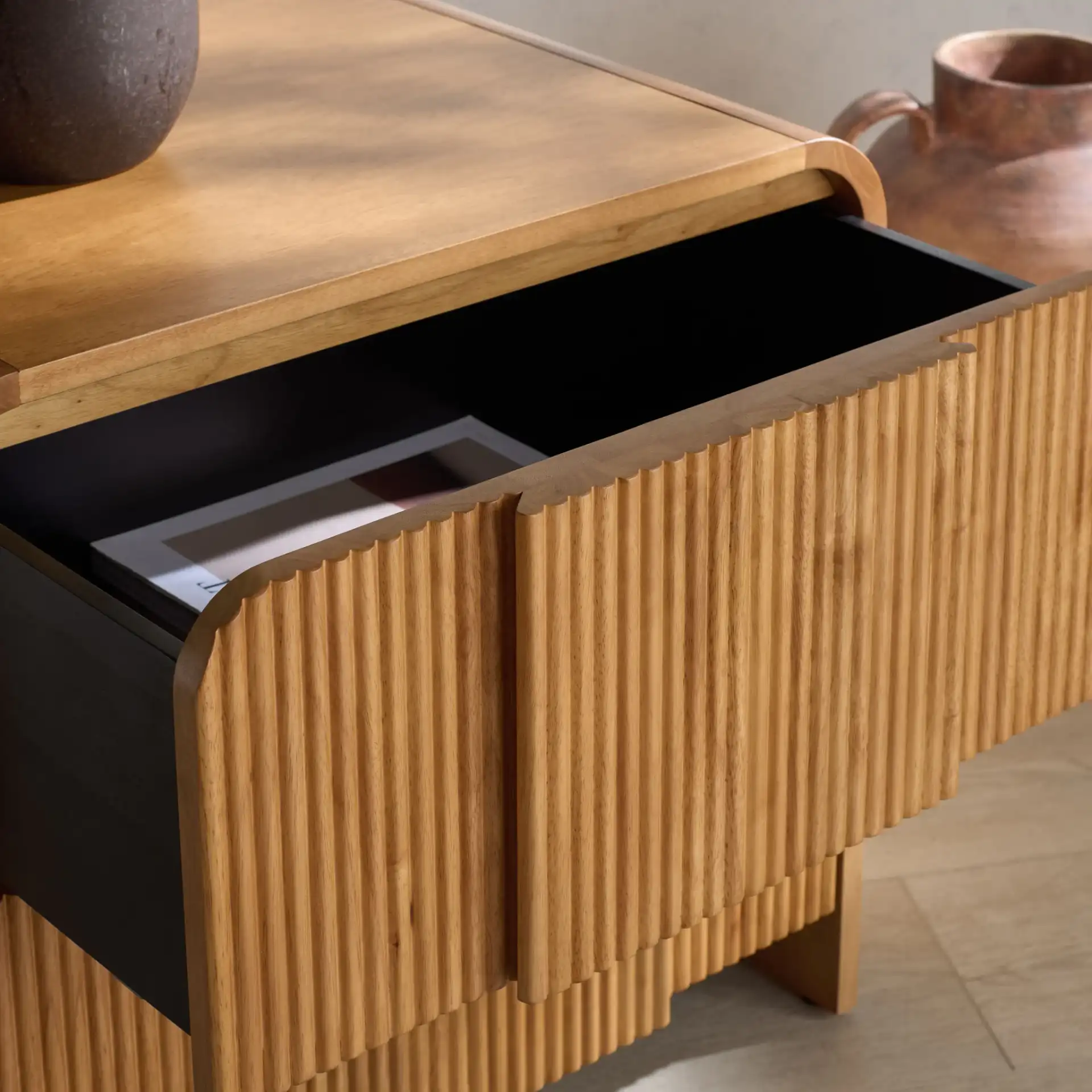 Vitale Reeded Wood Nightstand in Natural in a styled room