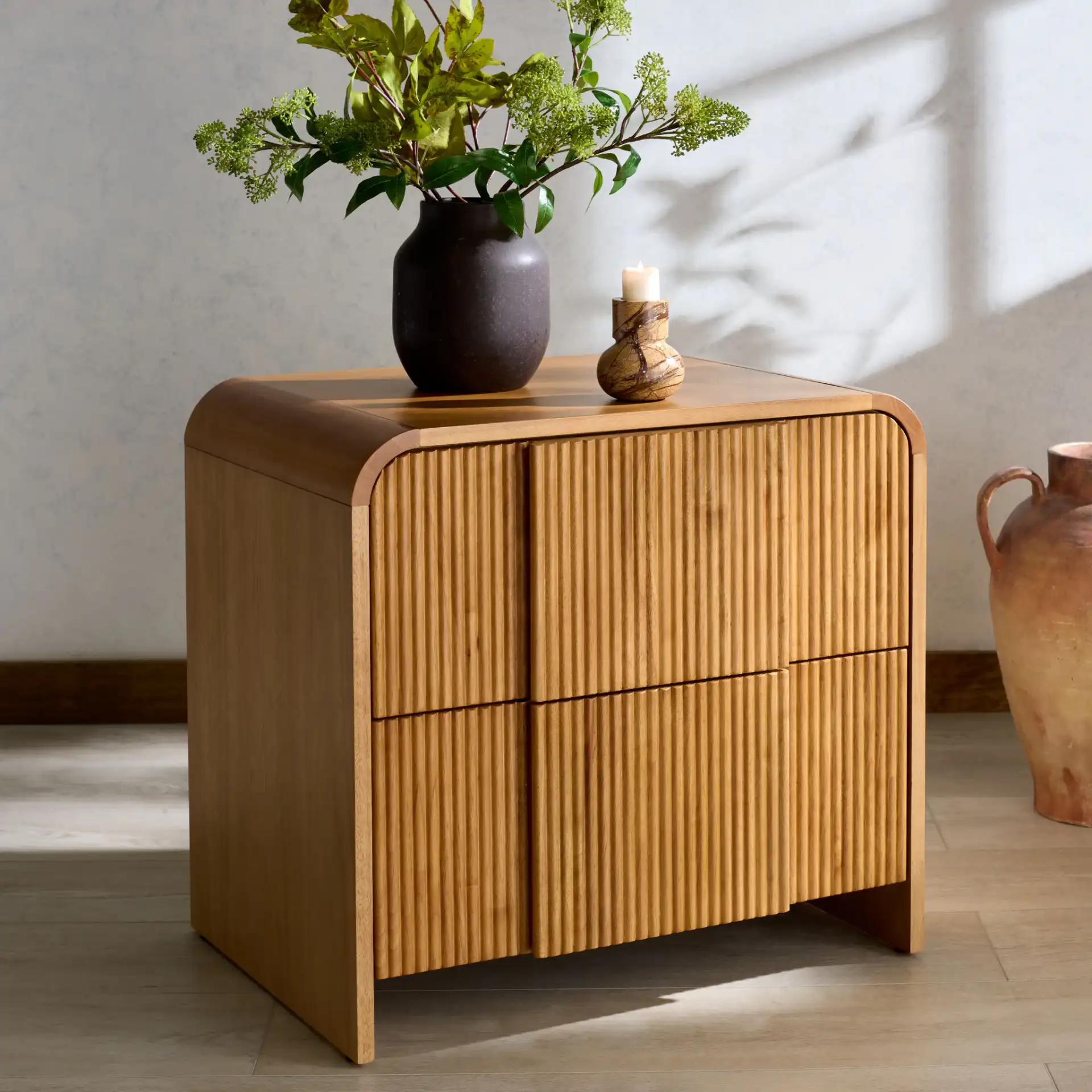 Vitale Reeded Wood Nightstand in Natural in a styled room