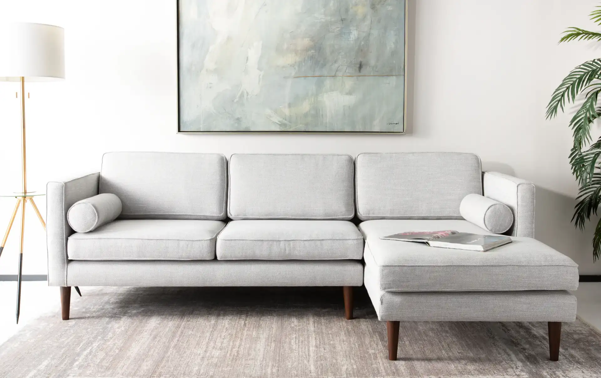 Dulce Mid-Century Chaise Sofa in Light Grey / Brown in a styled room