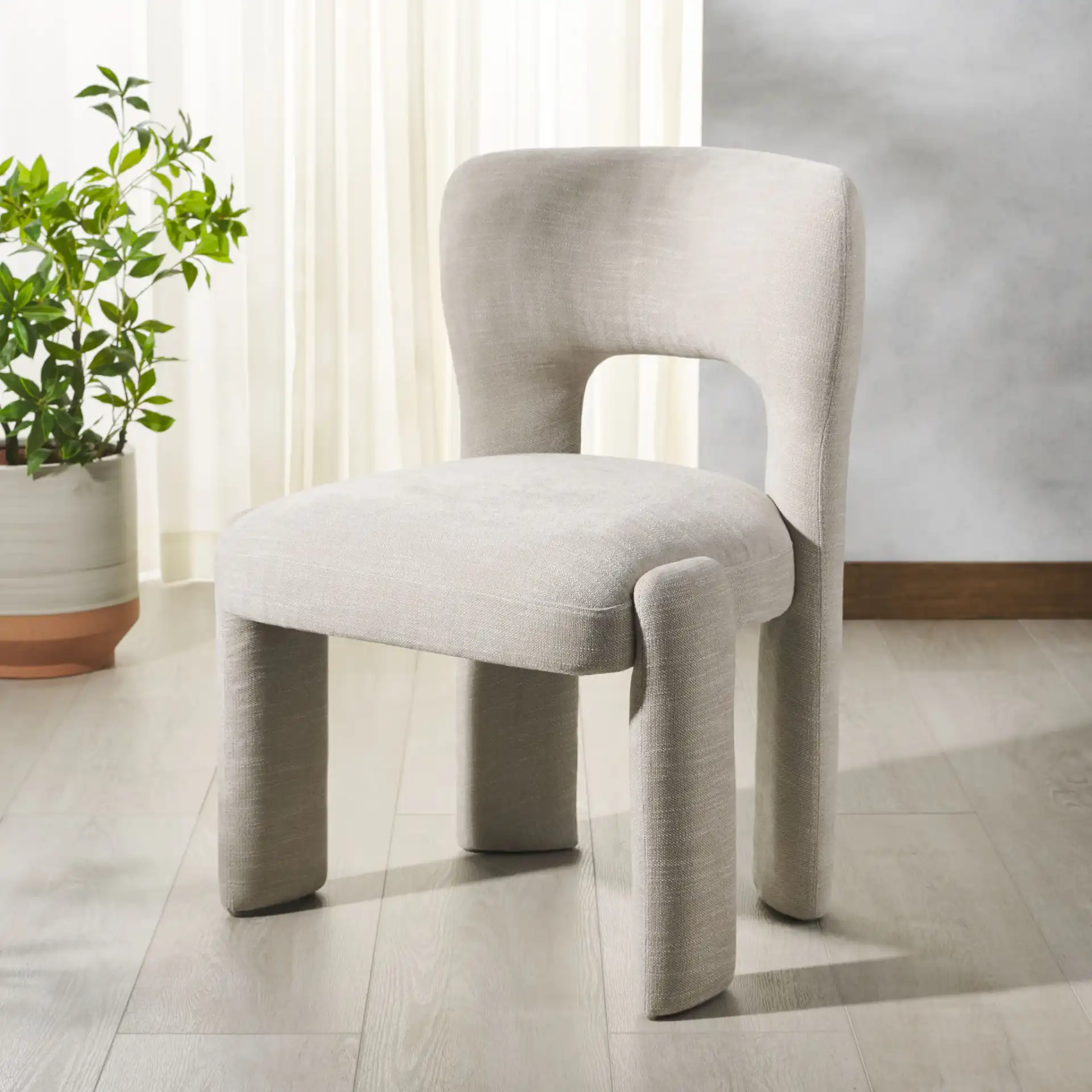 Tamlyn Dining Chair in Beige in a styled room