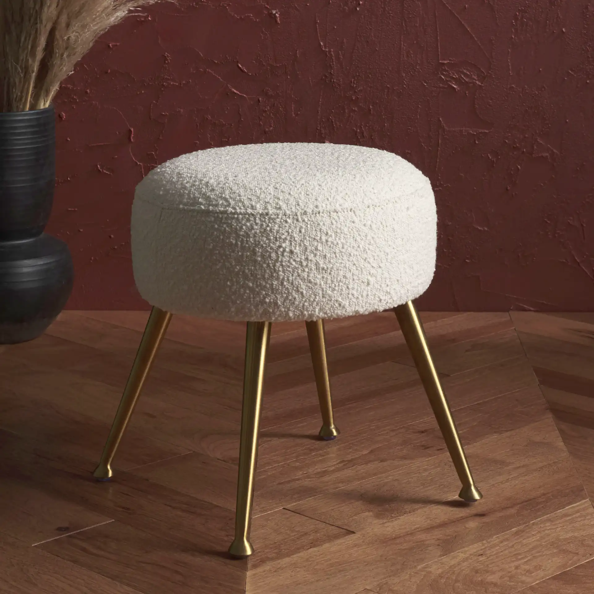 Anna Ottoman in Ivory / Gold in a styled room