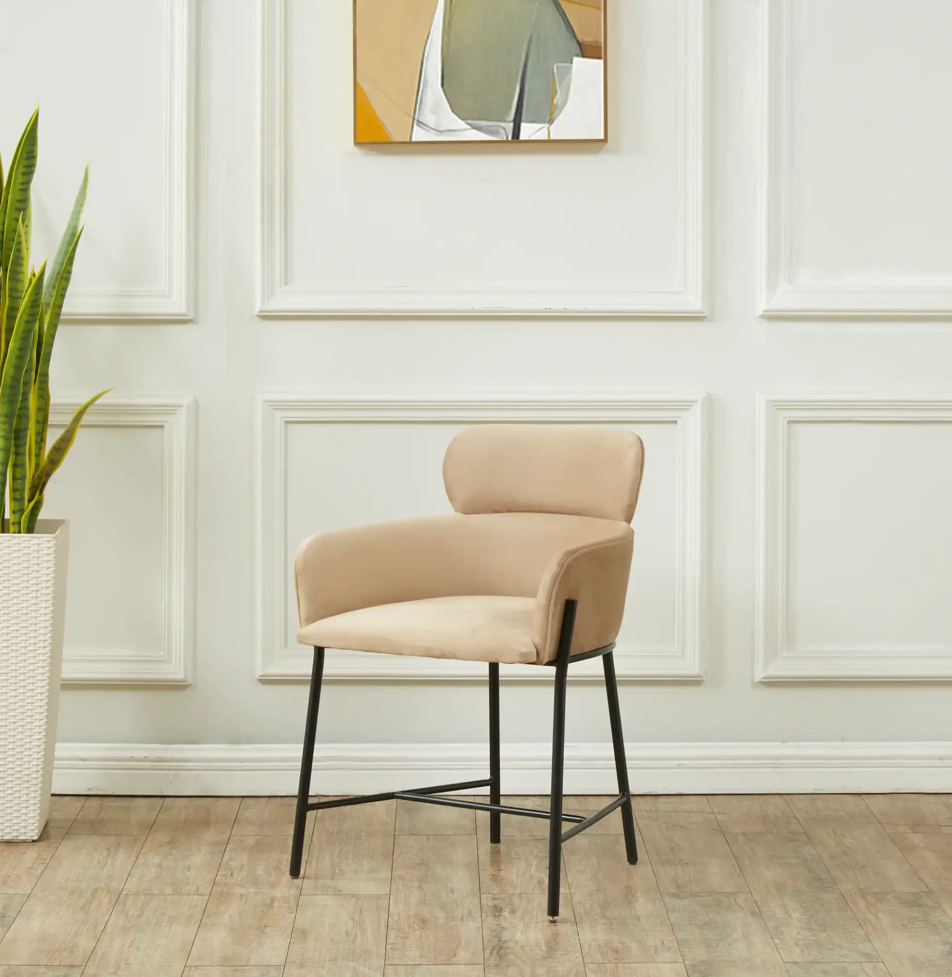 Charlize Velvet Dining Chair in Navy / Gold in a styled room