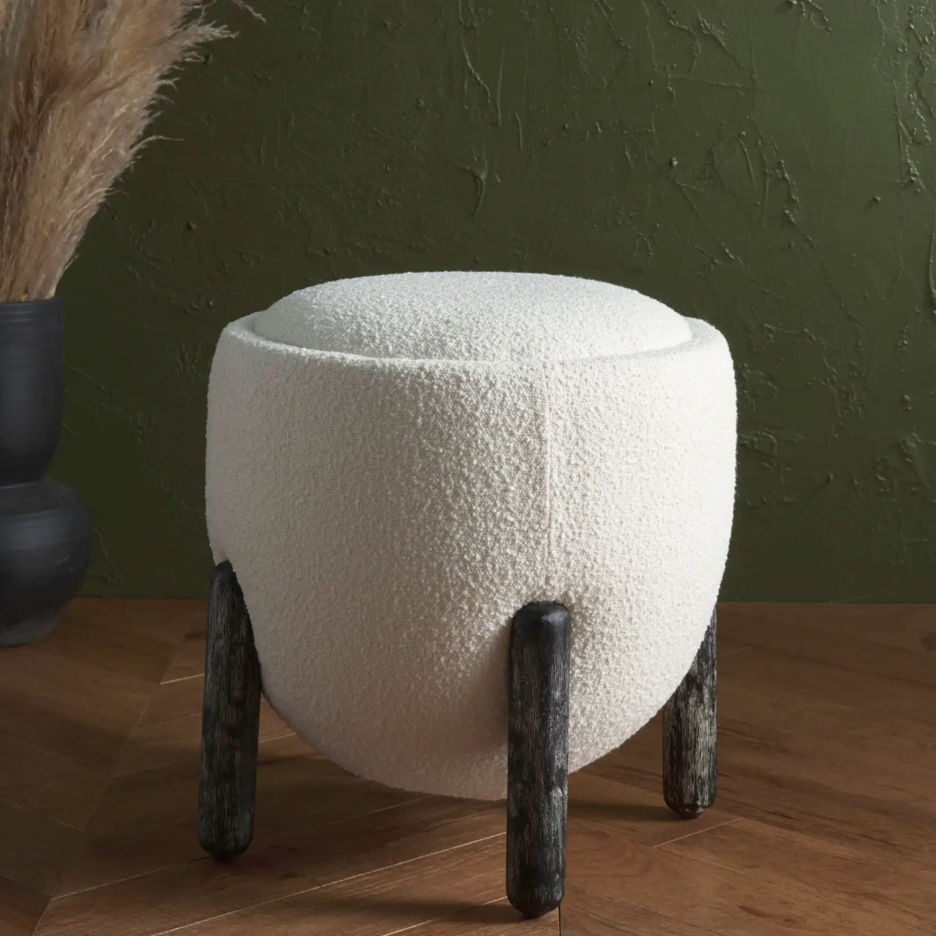 Clarabella Upholstered Ottoman in Brown / Black in a styled room