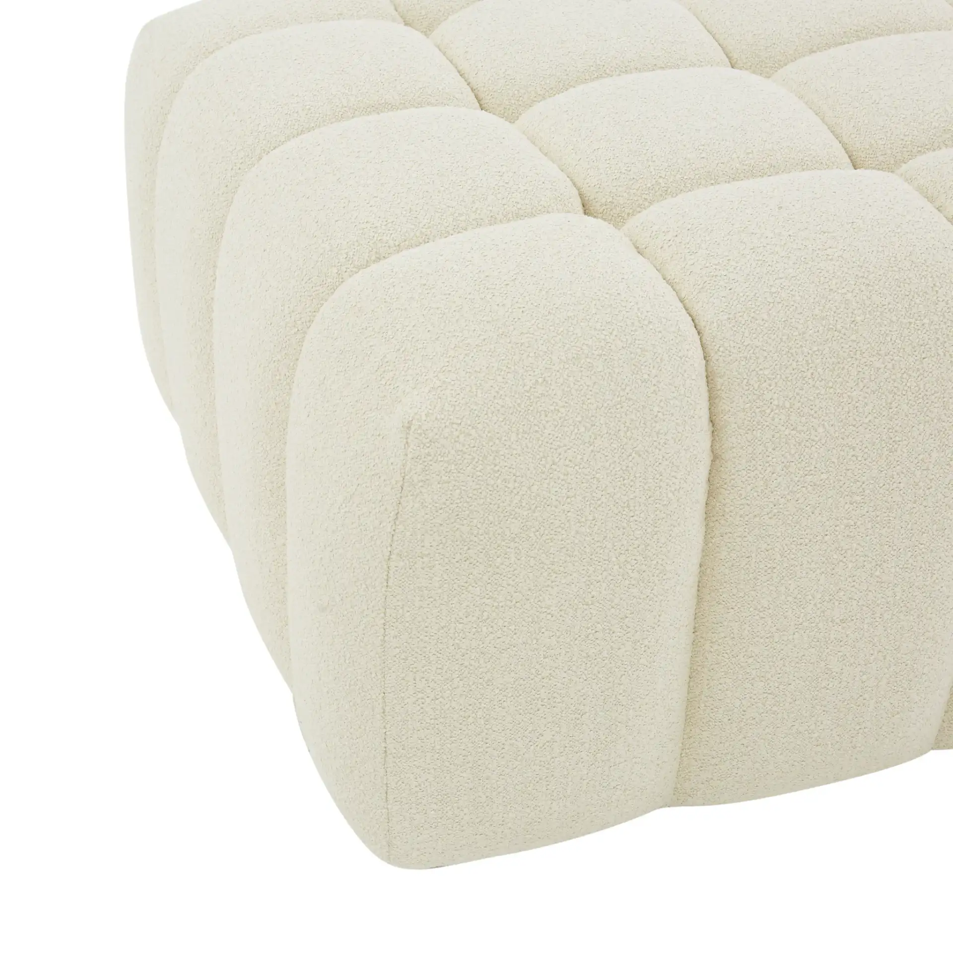 Calyna Boucle Ottoman in Cream in a styled room