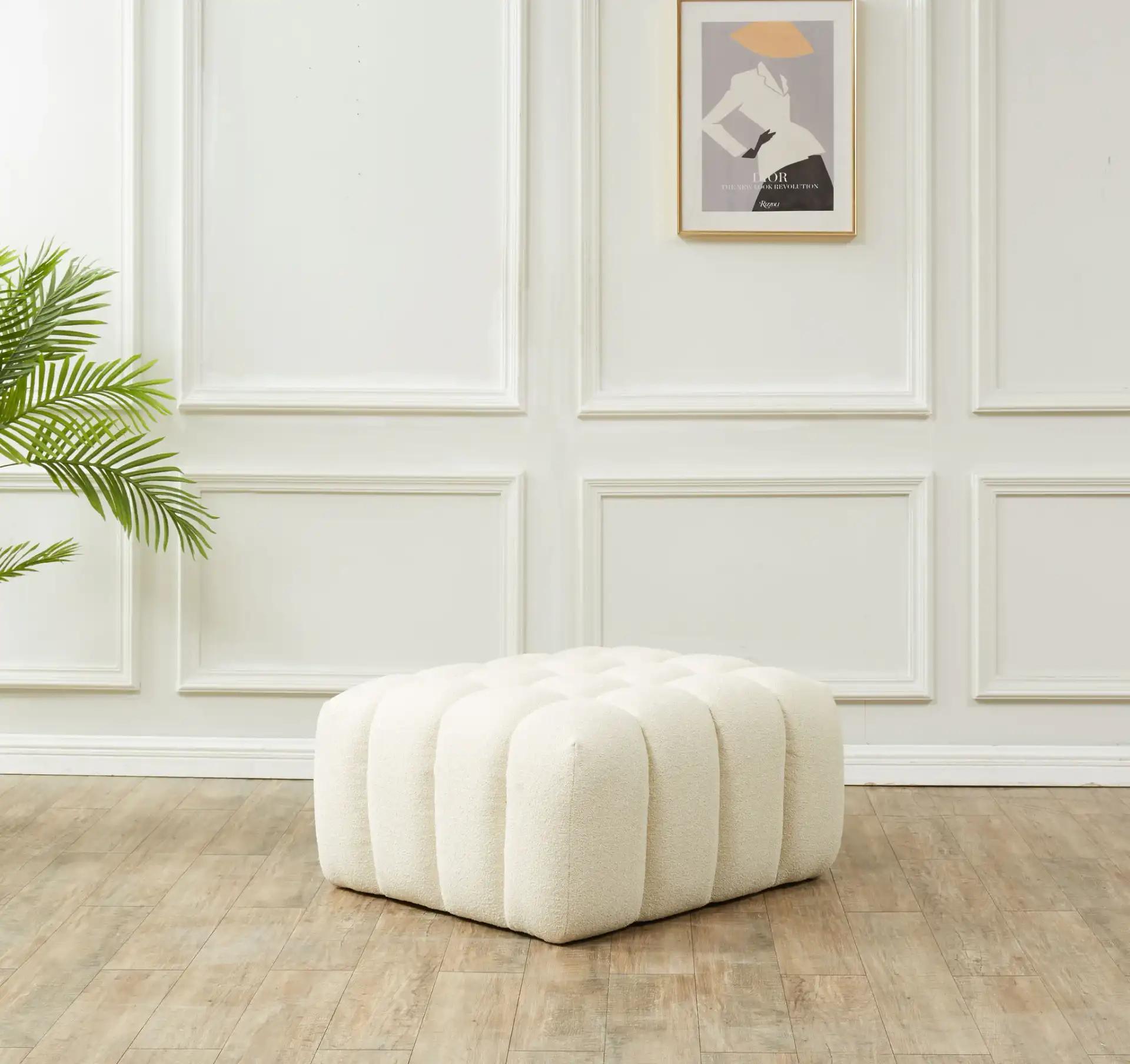 Calyna Boucle Ottoman in Cream in a styled room