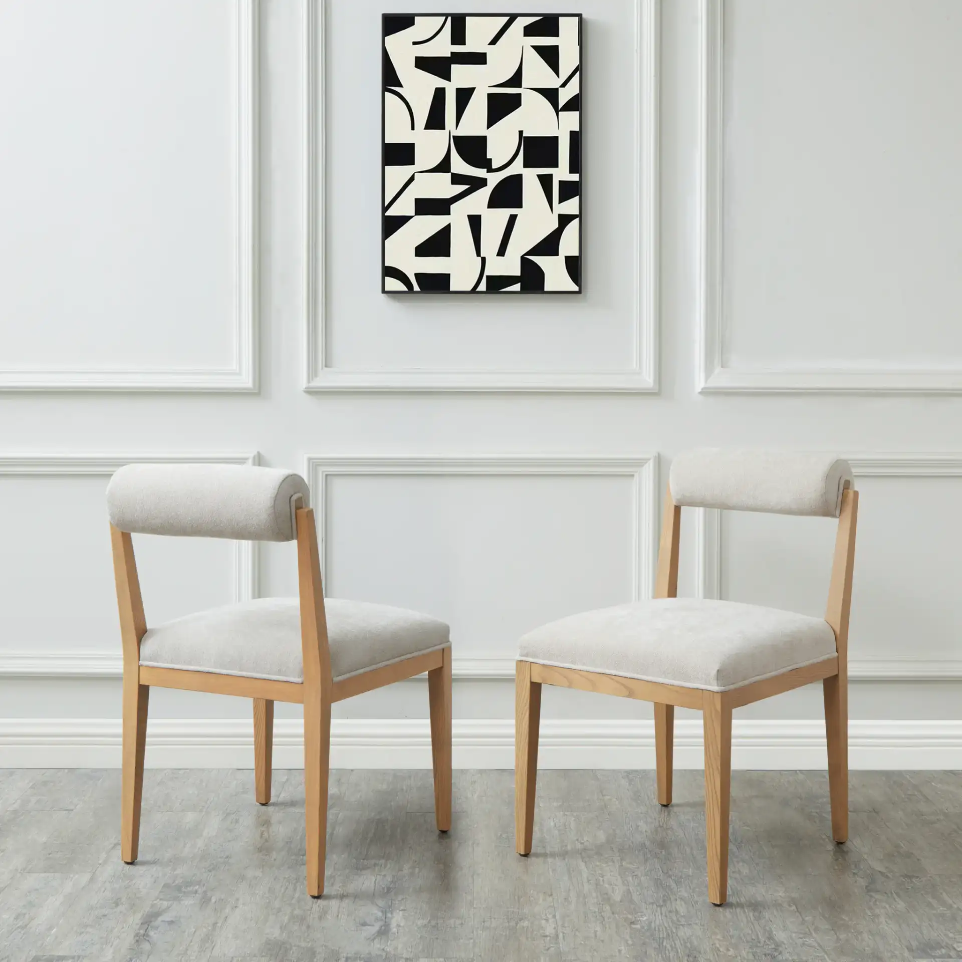 Oaklie Rolled Back Dining Chair in Taupe / Natural in a styled room