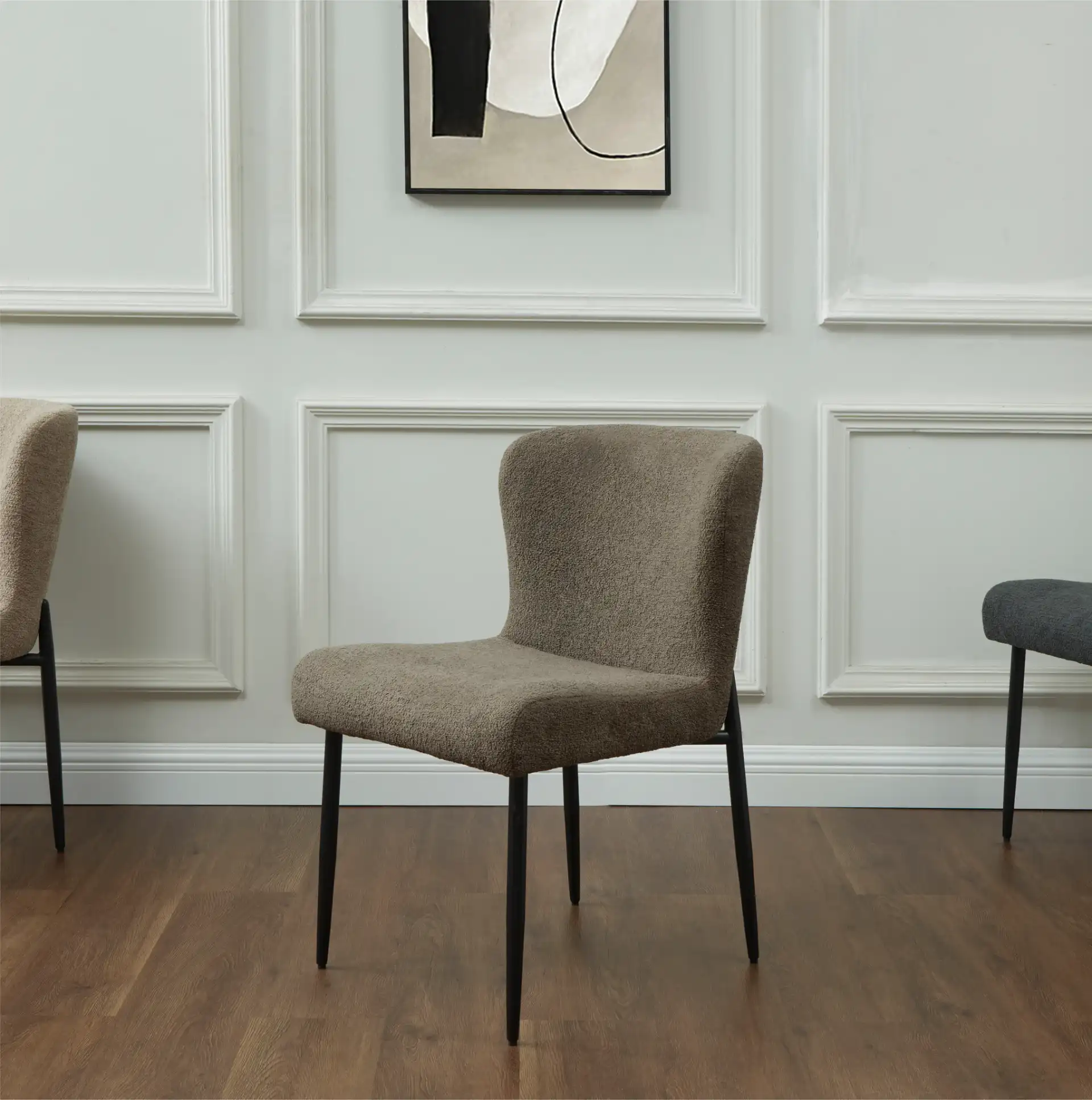 Katlynn Boucle Dining Chair in Dark Gray / Black in a styled room