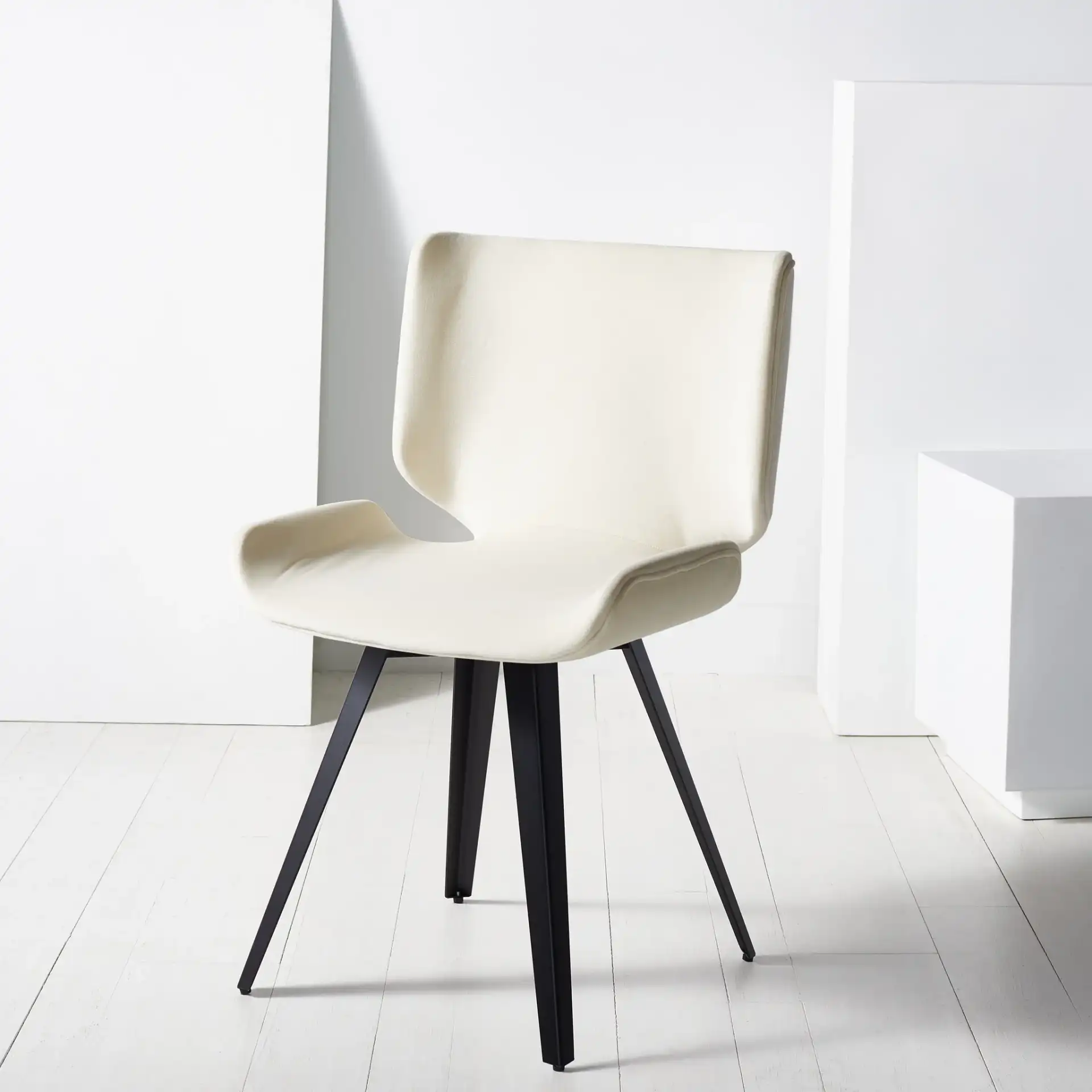 Matty Scandinavian Dining Chair in Cream in a styled room