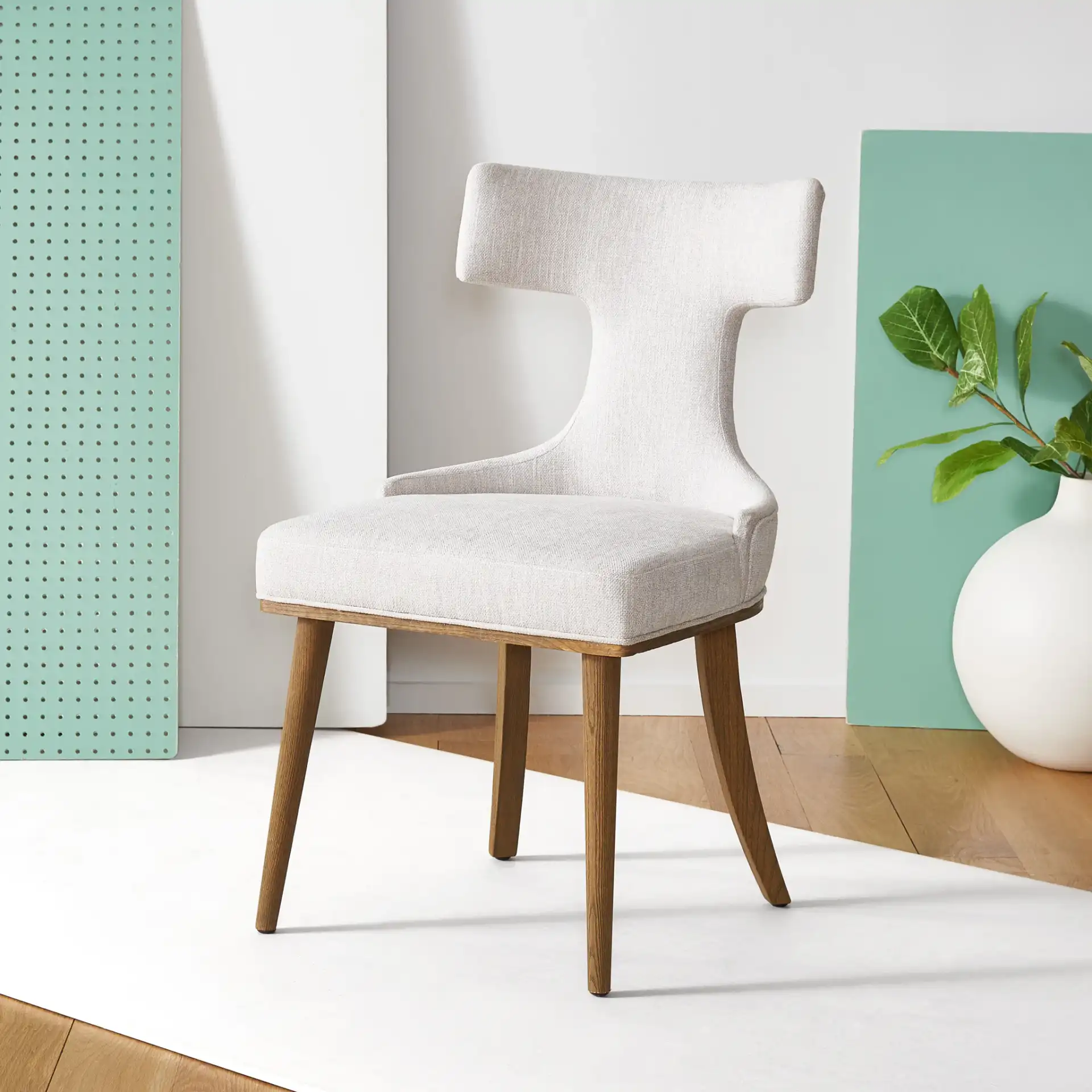 Krisalyn Linen Dining Chair in Taupe in a styled room