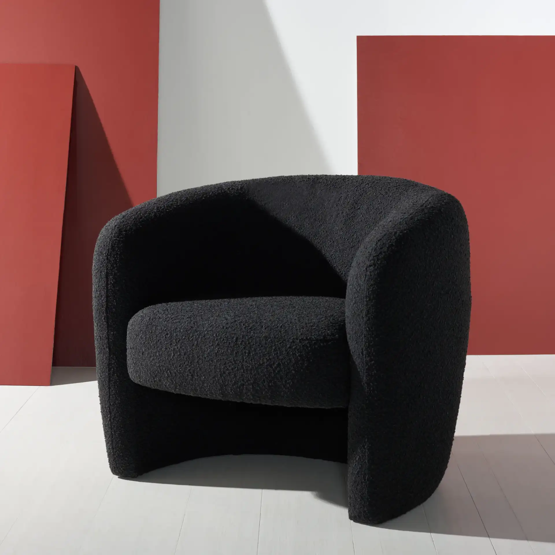 Everly Barrel Back Accent Chair in Black in a styled room