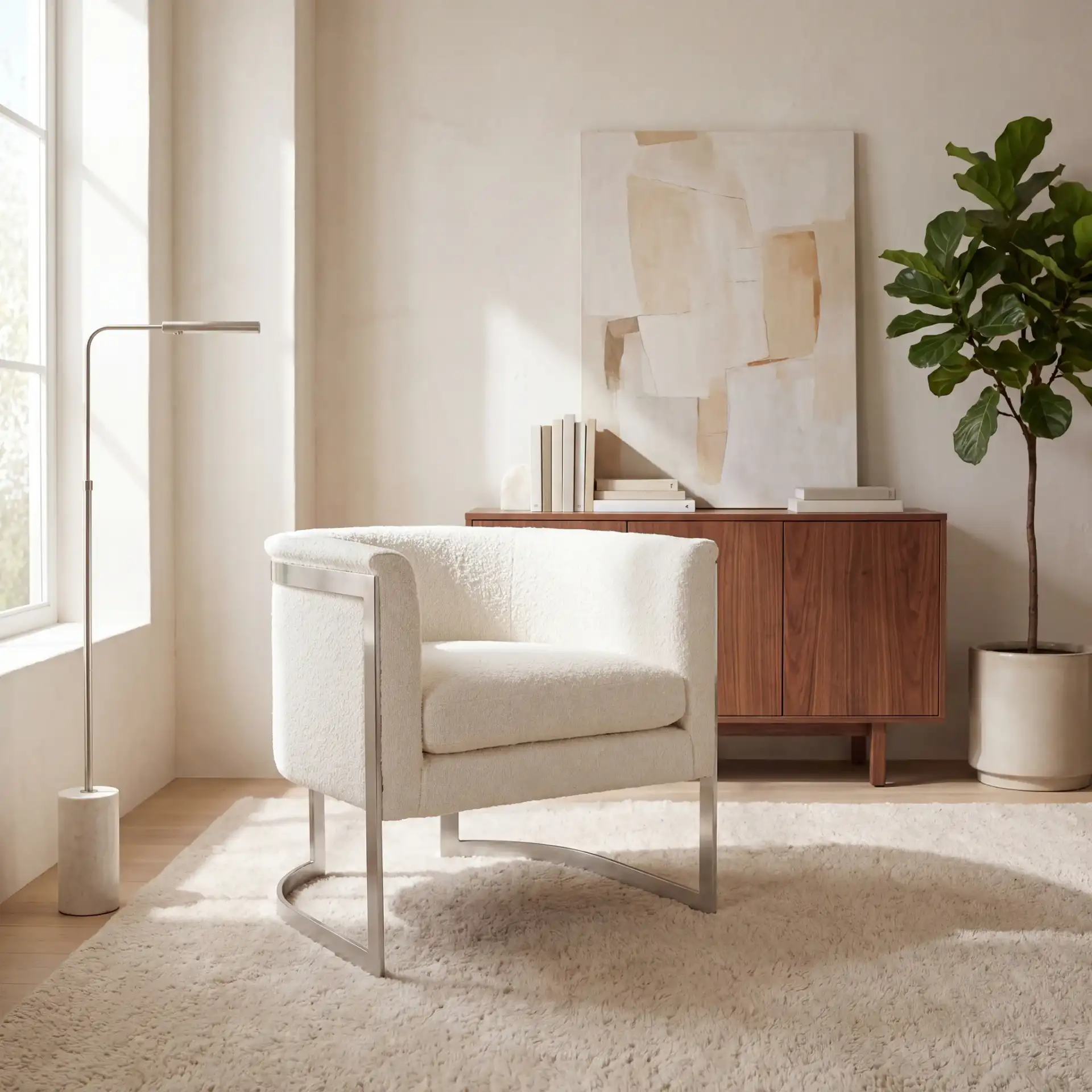 Gabby Barrel Back Accent Chair in Ivory / Silver in a styled room