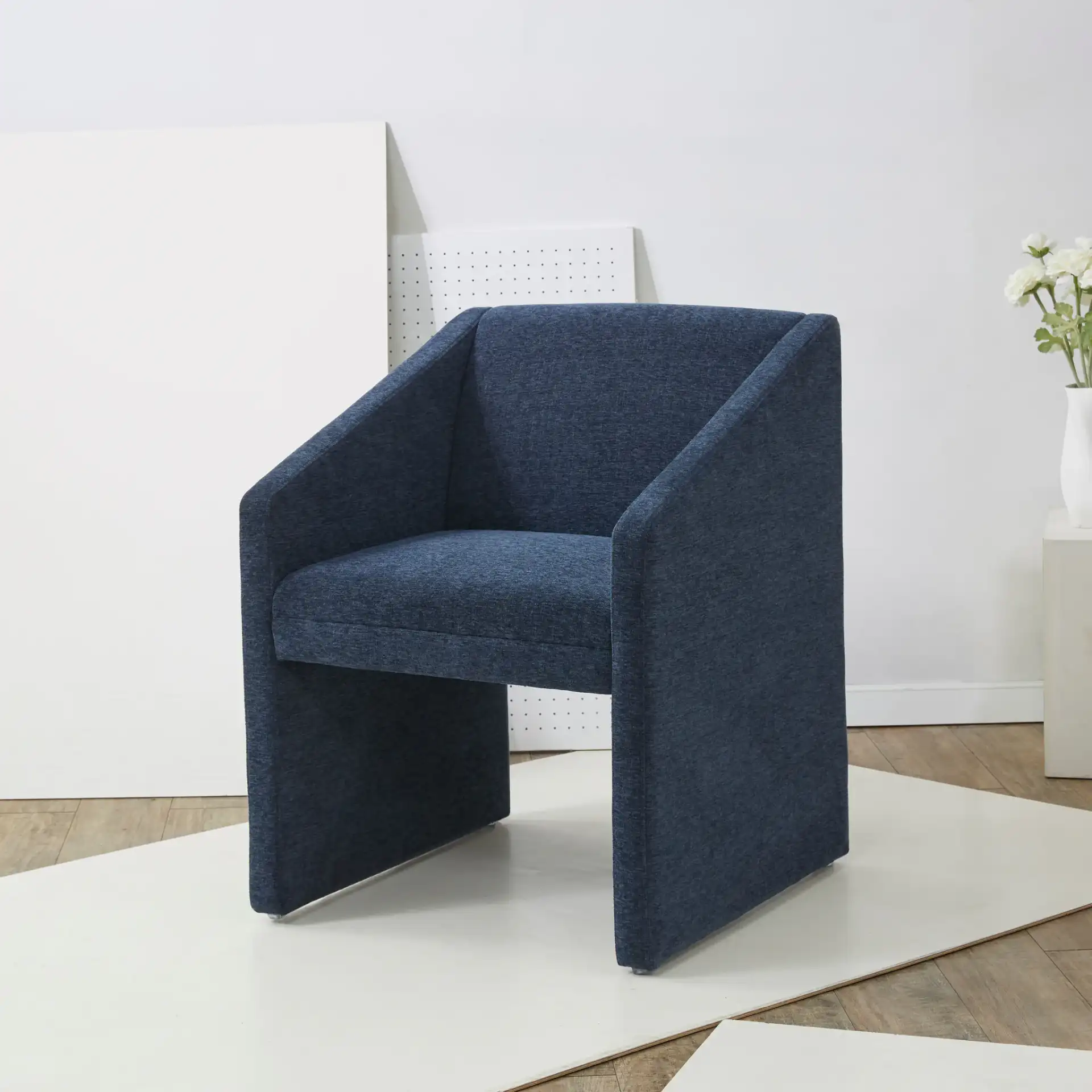 Liandra Upholstered Armchair in Cream in a styled room