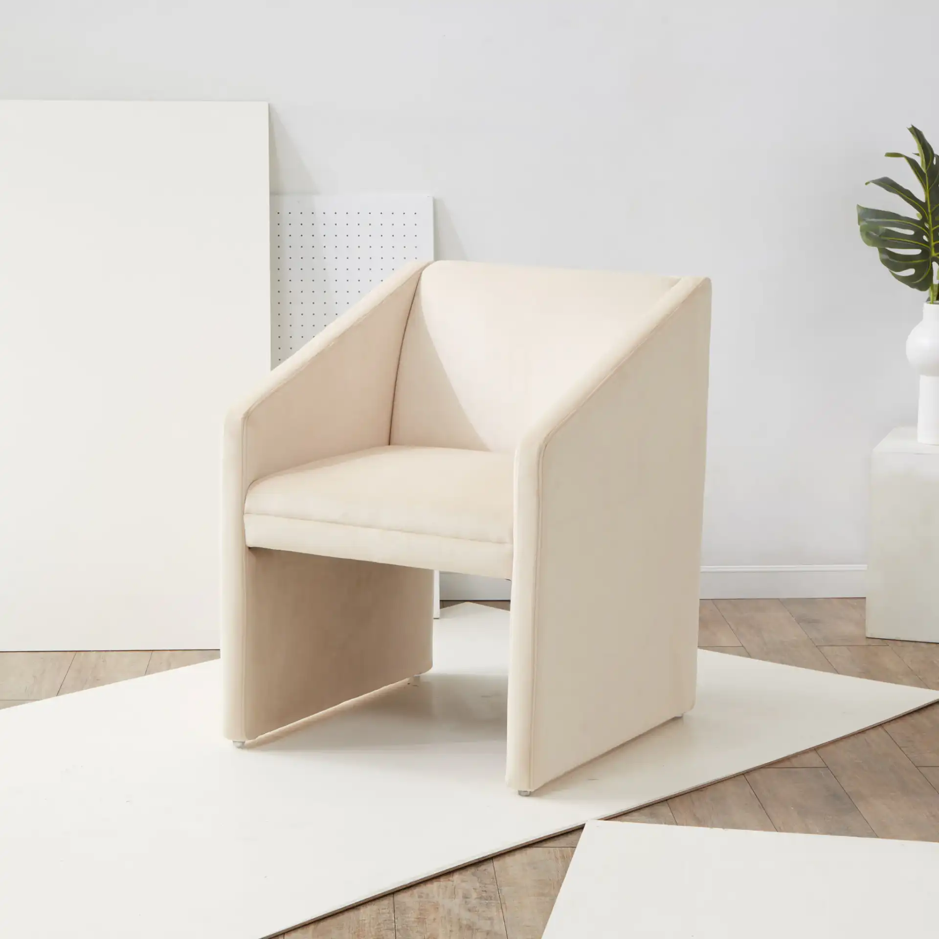 Liandra Upholstered Armchair in Cream in a styled room