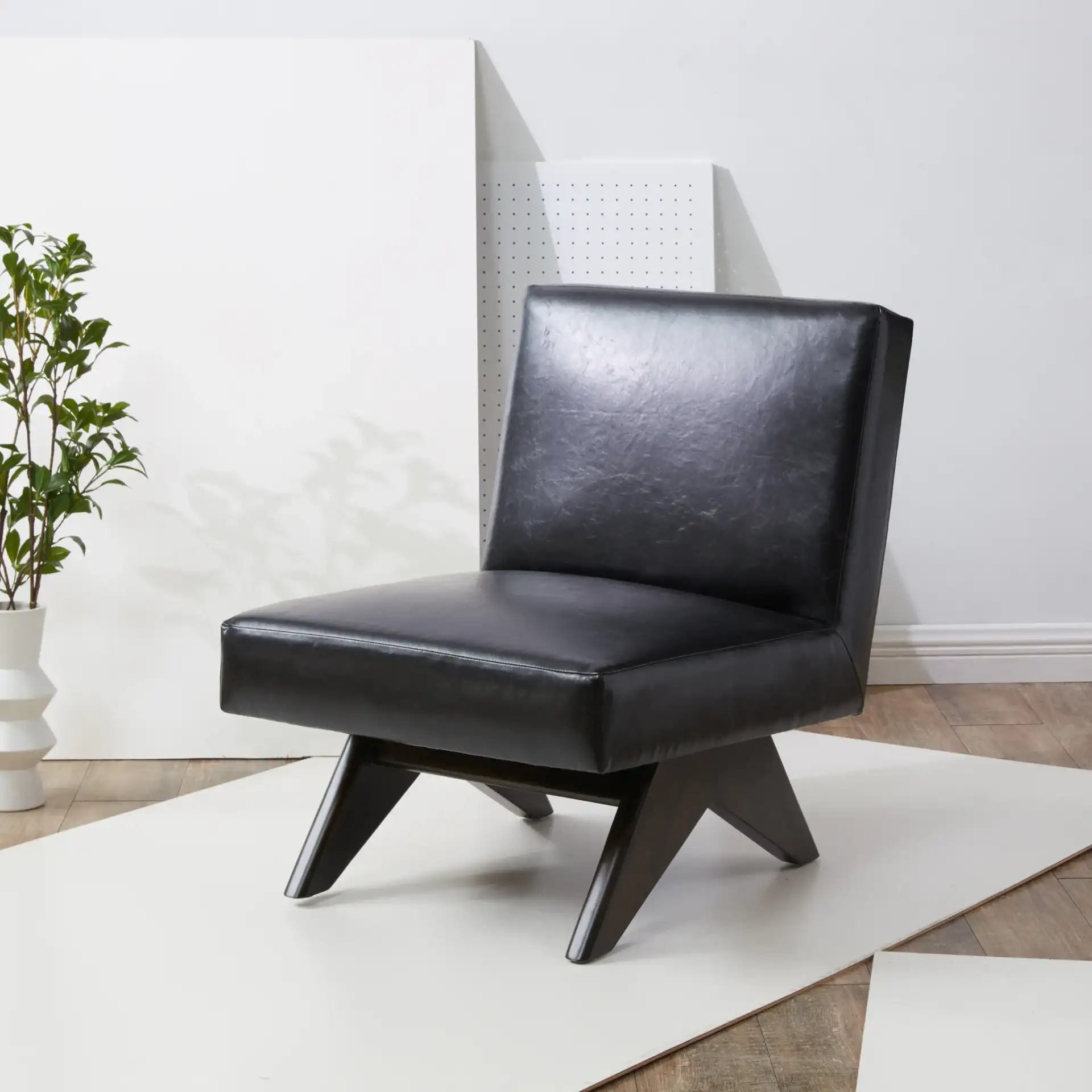 Deasha Accent Chair in Black / Walnut in a styled room
