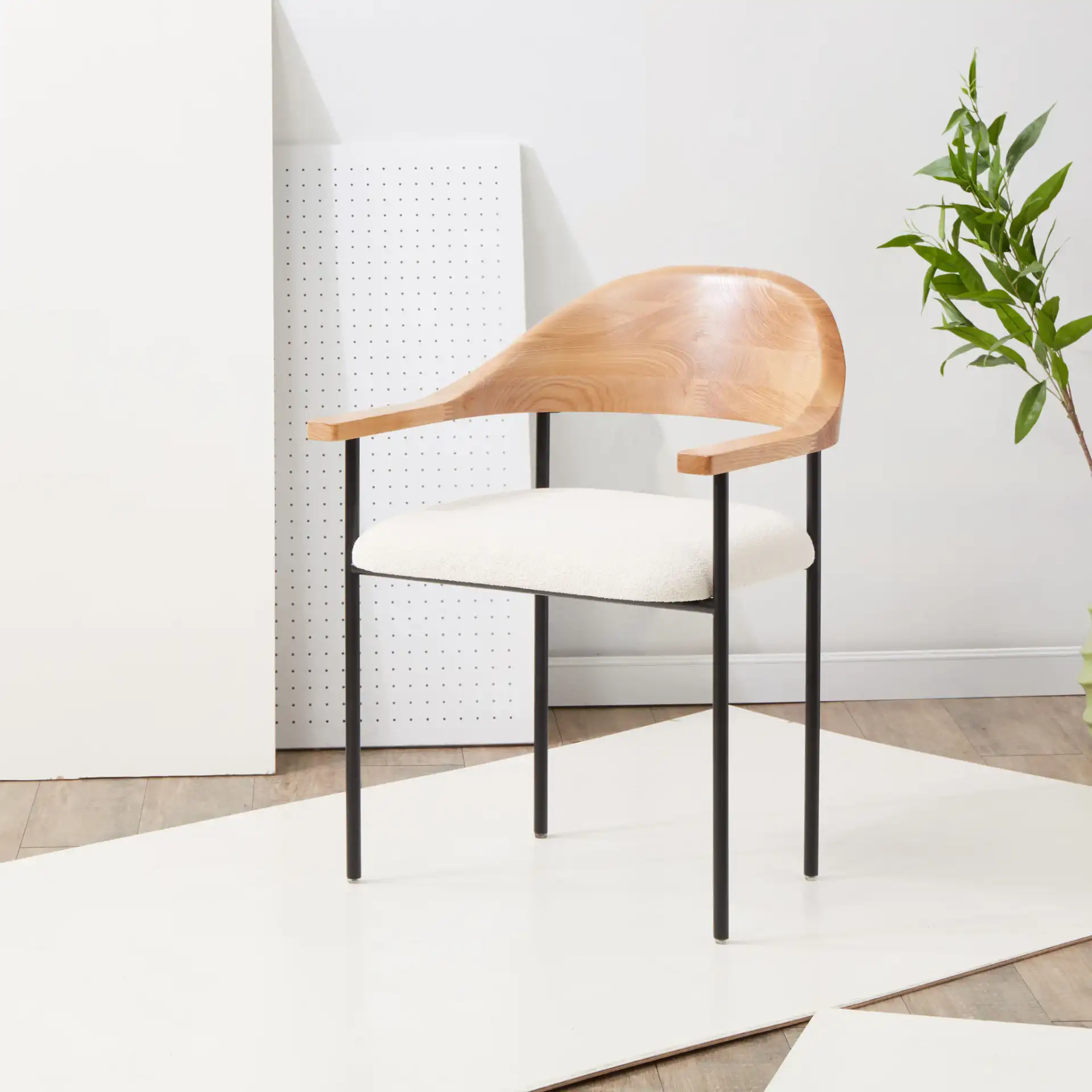 Denver Boucle Dining Chair in Ivory / Black in a styled room