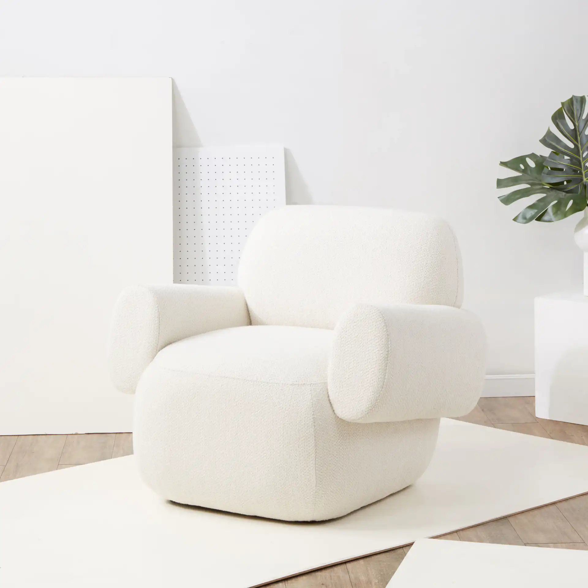 Pryce Upholstered Accent Chair in Ivory in a styled room