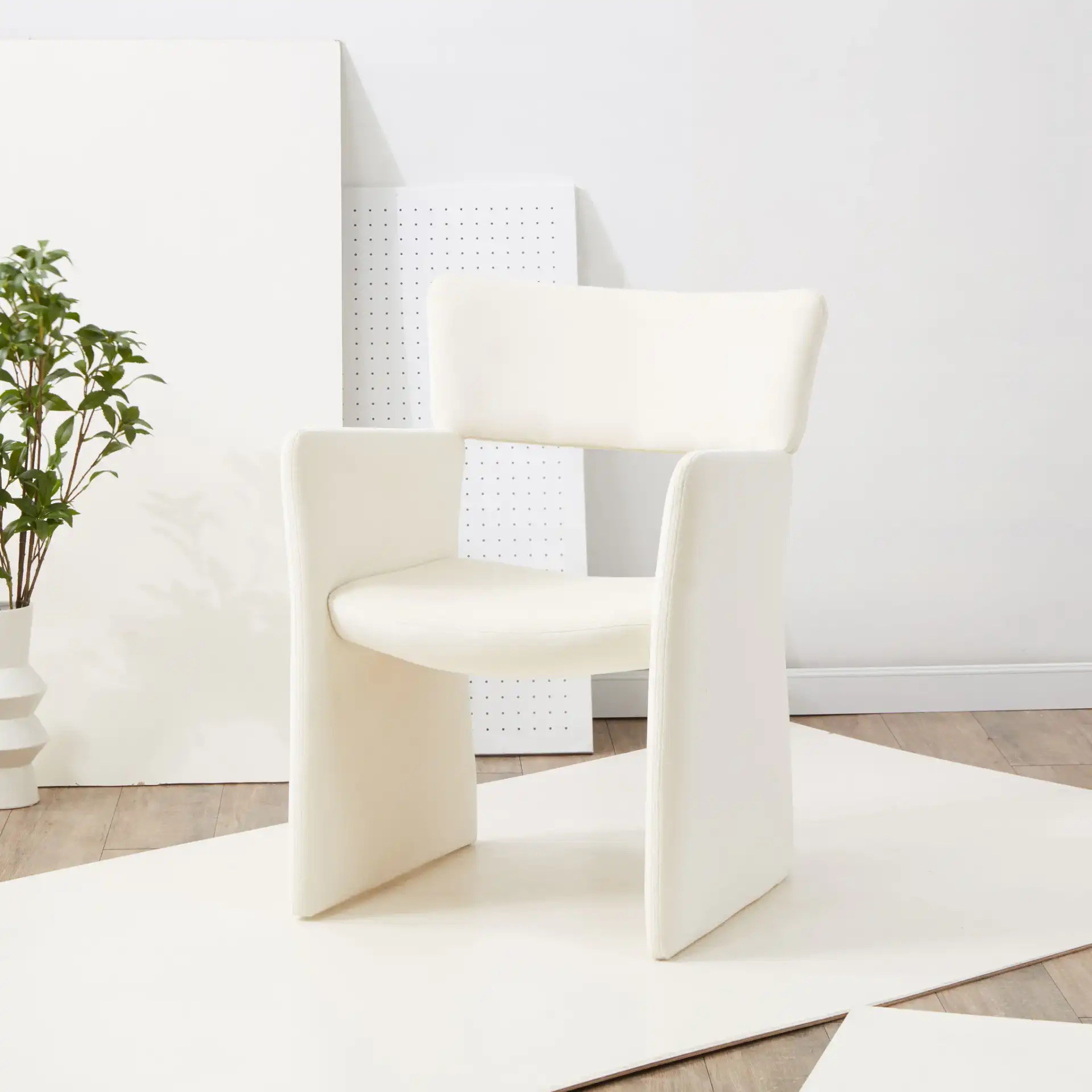 Jayke Velvet Dining Chair in Cream in a styled room