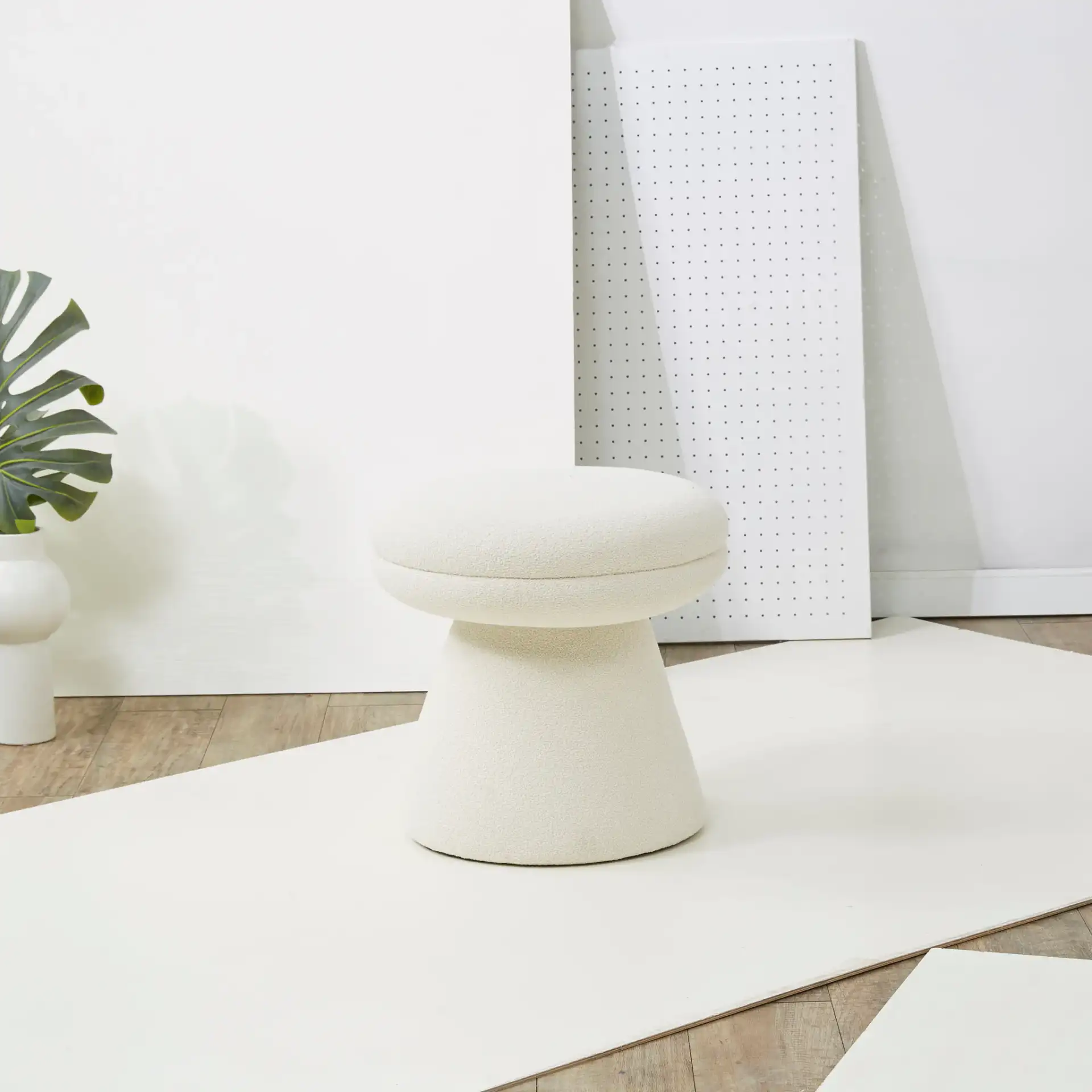 Gisella Boucle Ottoman in Ivory in a styled room