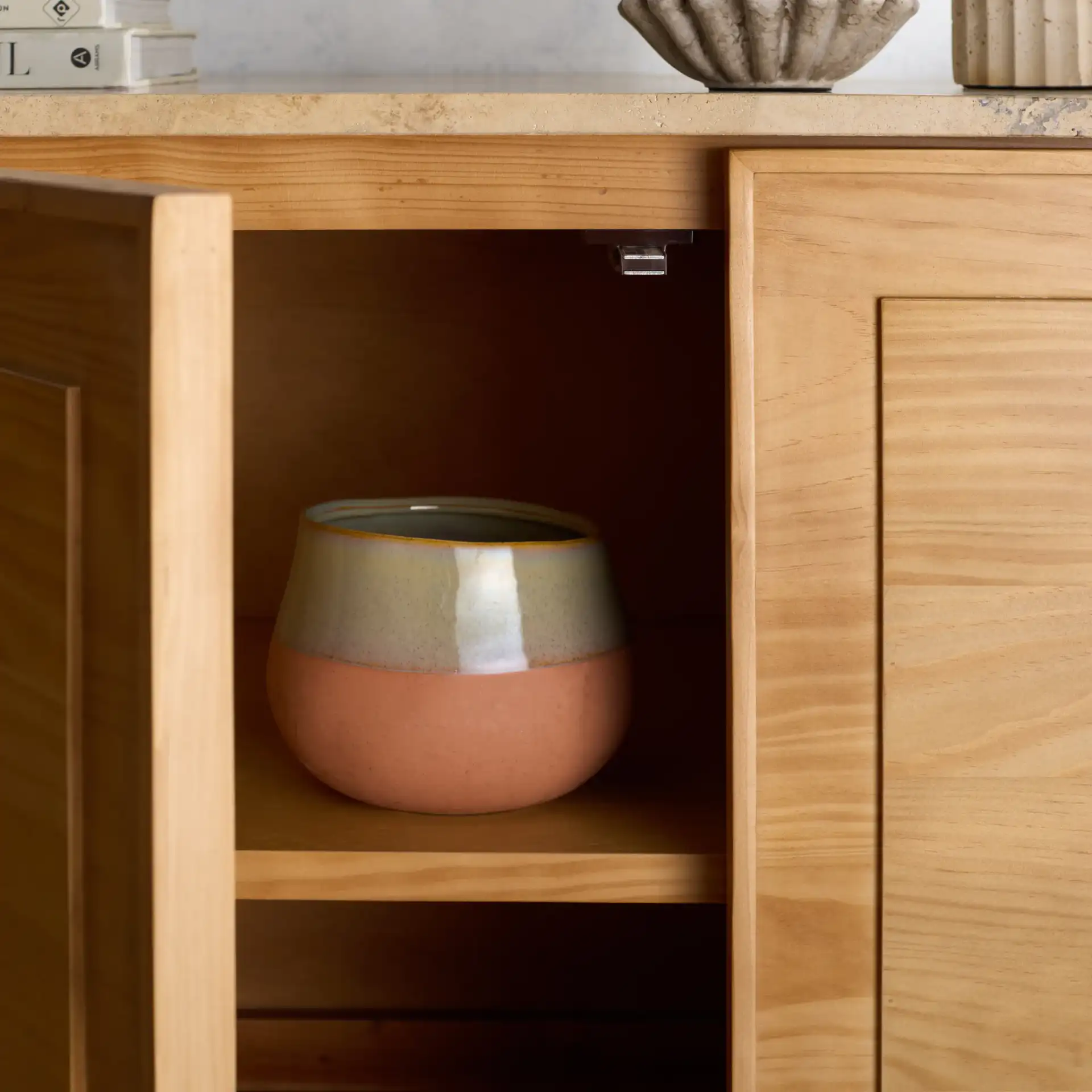Debrianna Travertine Sideboard in Natural / Travertine in a styled room