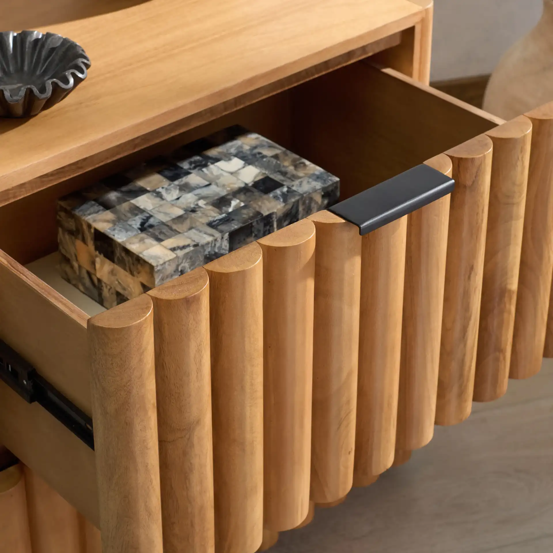 Renata Fluted Wood Nightstand in Natural / Black in a styled room