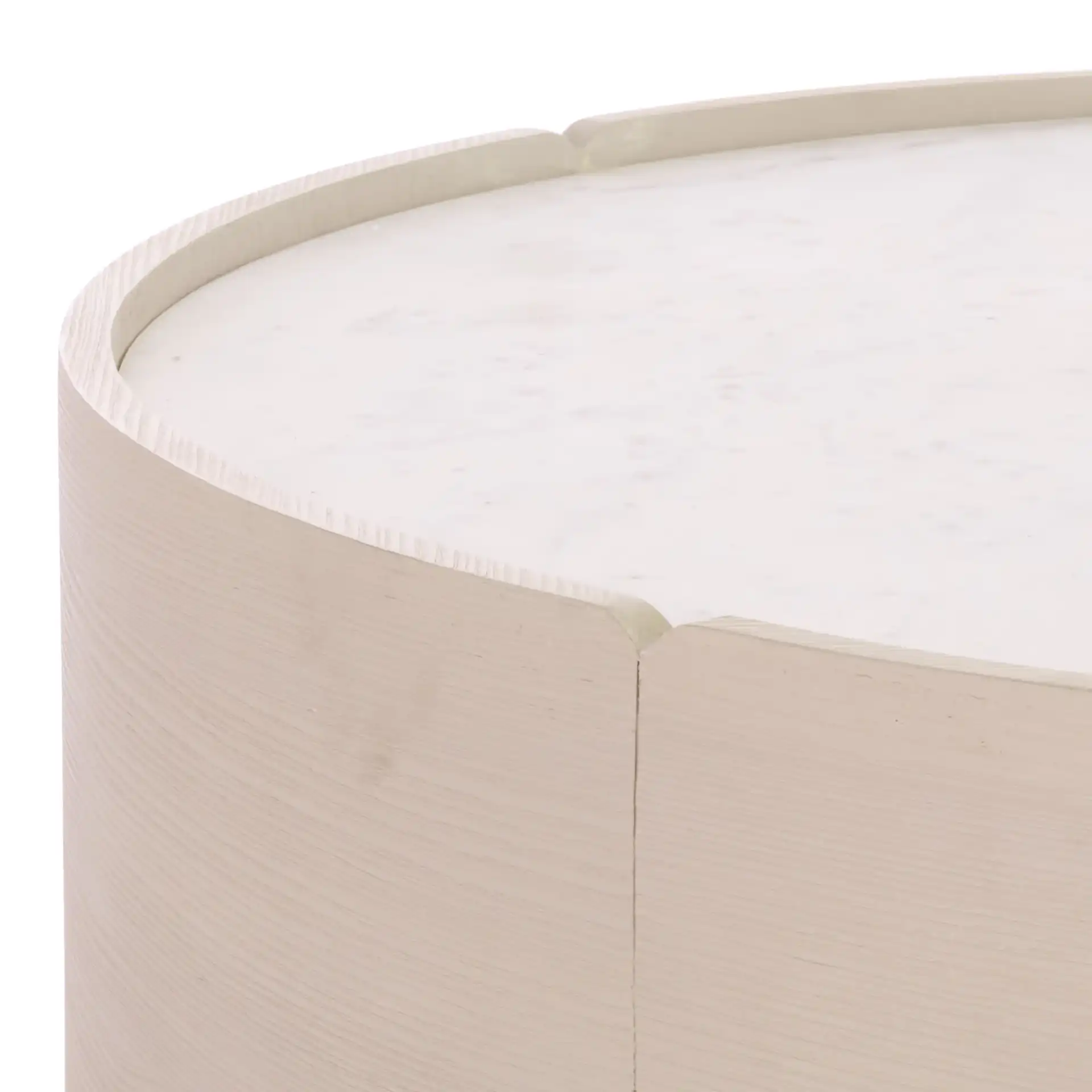 Alanabella Marble Round Coffee Table in Sand / White in a styled room