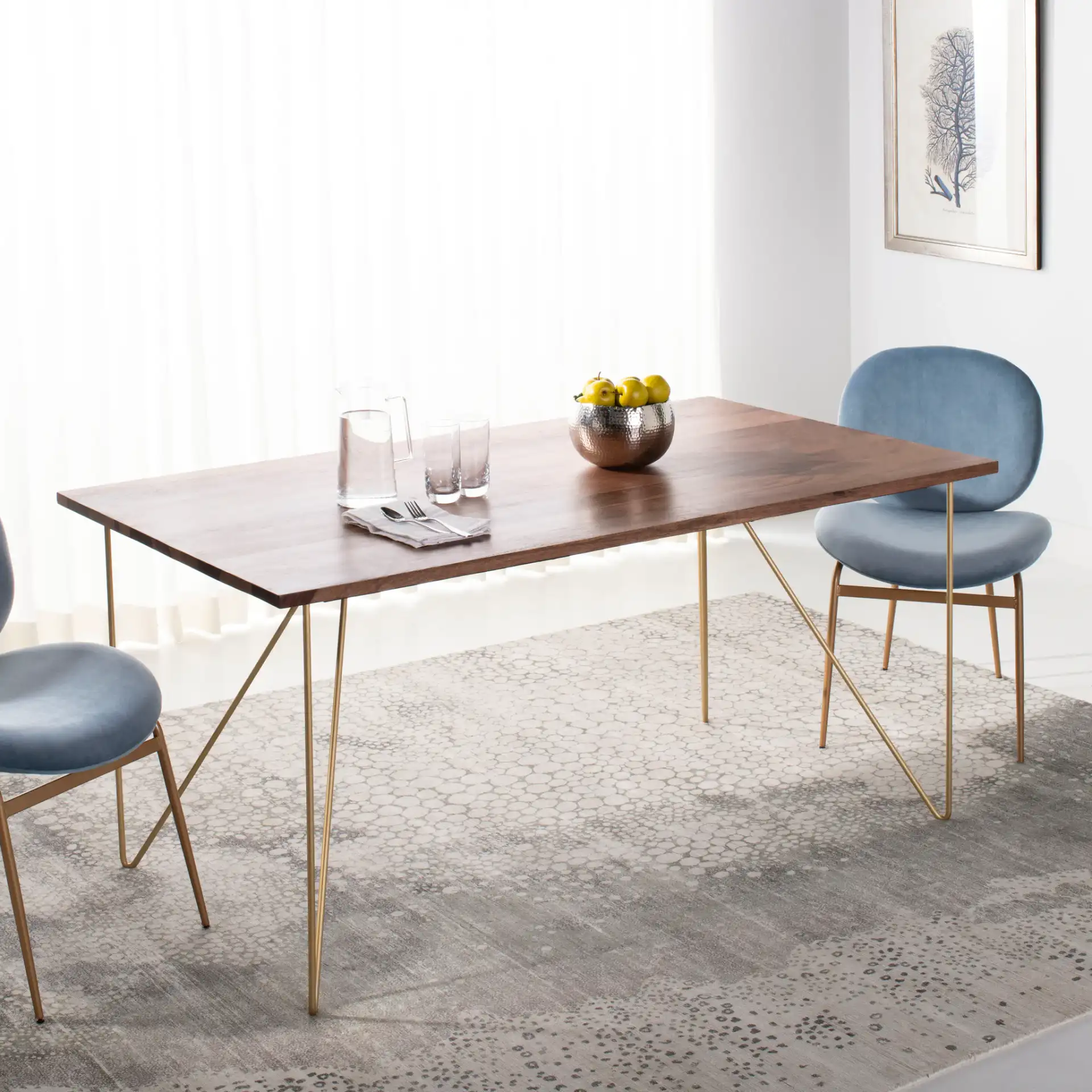 Captain Wood Dining Table in Walnut / Brass in a styled room