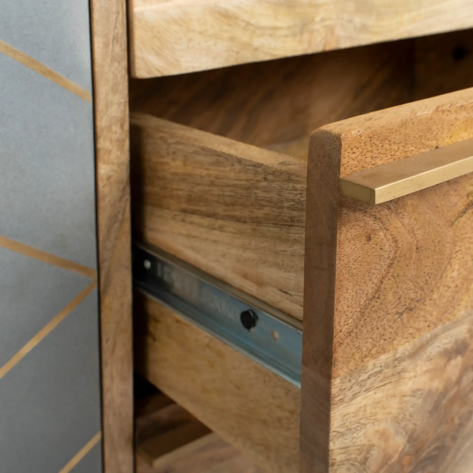 Titan Inlayed Cement Sideboard in Natural / Brass in a styled room