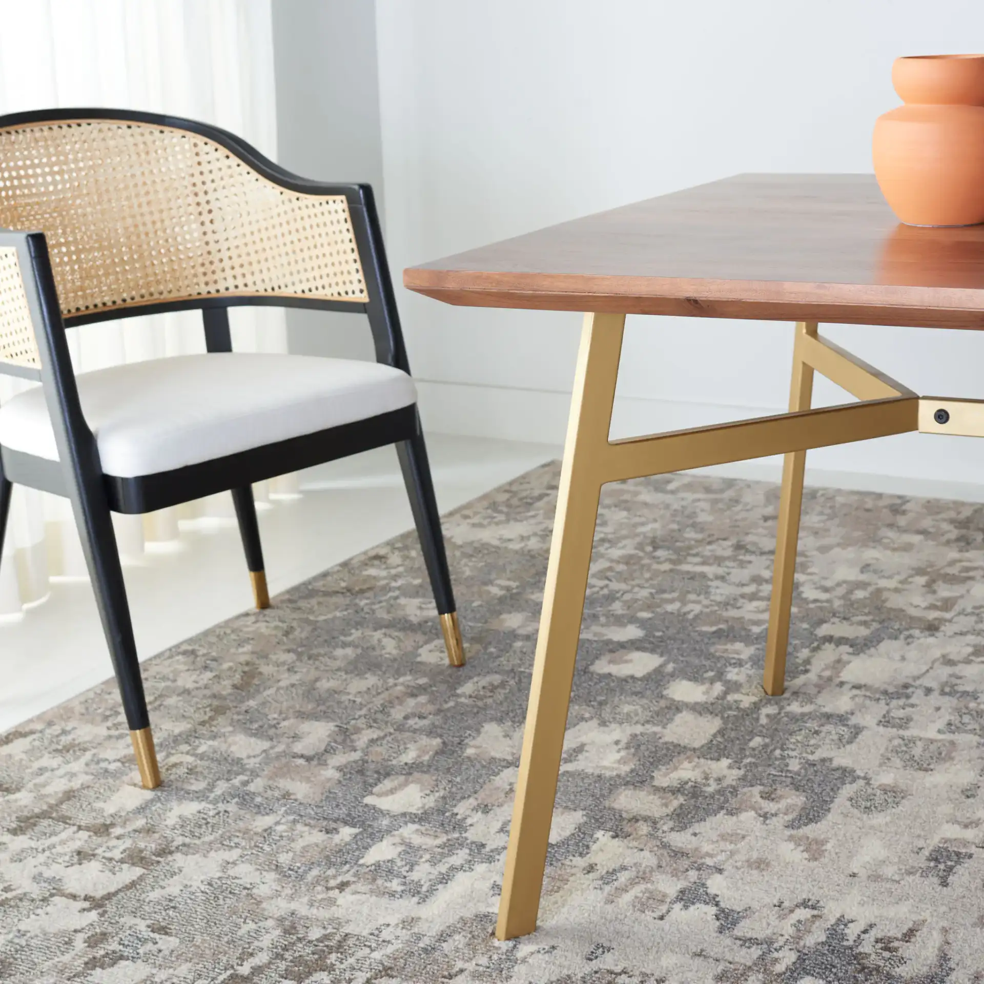 Dakota Rectangle Dining Table in Walnut / Gold in a styled room