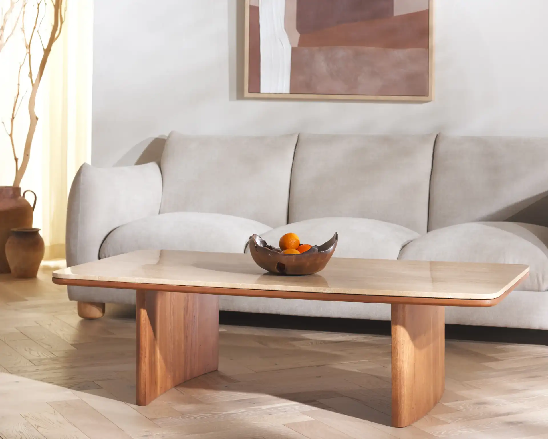 Trinsly Travertine Coffee Table in Natural / Travertine in a styled room