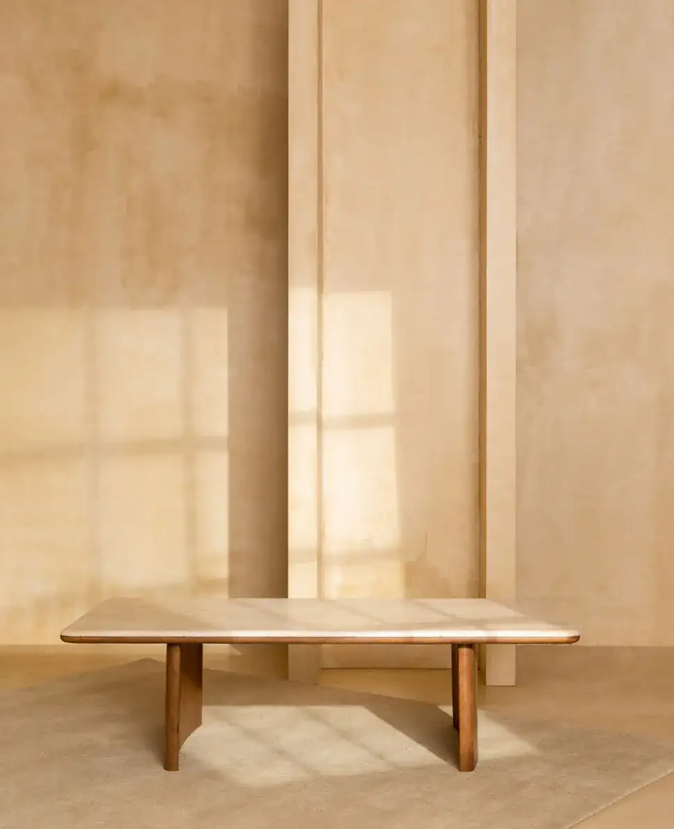 Trinsly Travertine Coffee Table in Natural / Travertine in a styled room