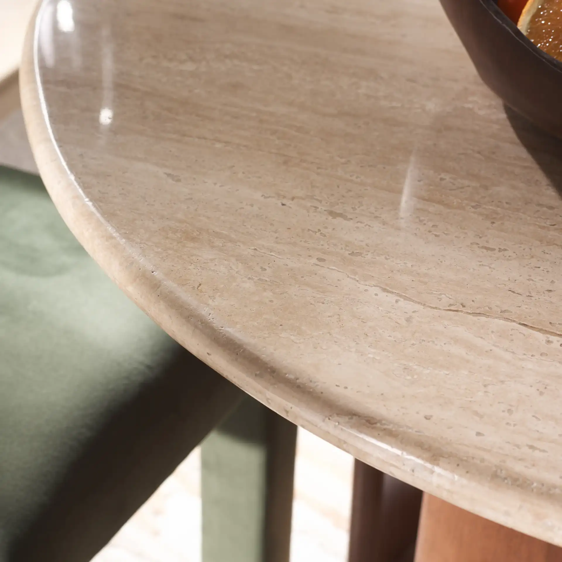 Trinsly Travertine Dining Table in Natural / Travertine in a styled room