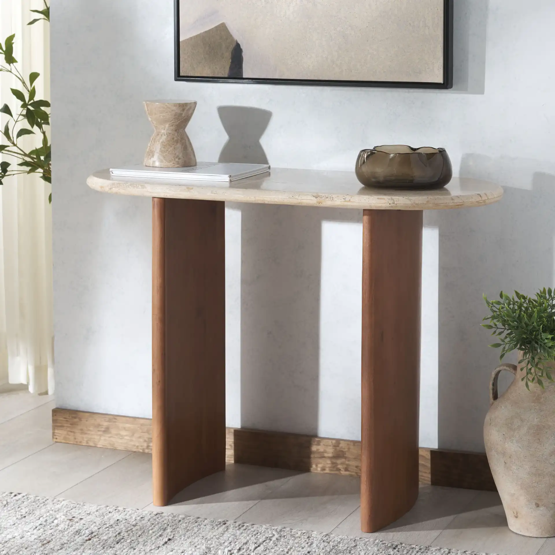 Trinsly Travertine Console Table in Natural / Travertine in a styled room