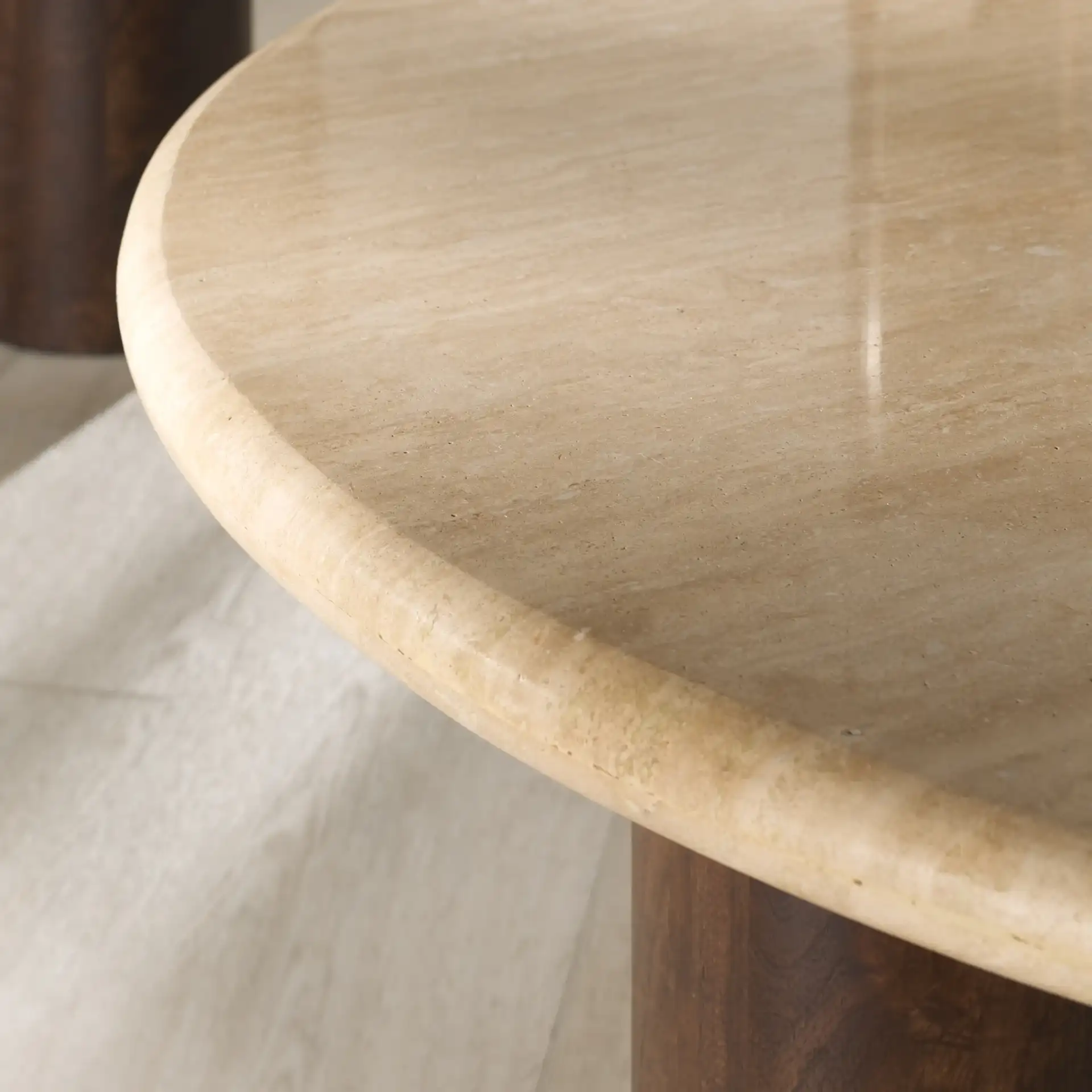 Jennamira Travertine Coffee Table in Dark Brown / Travertine in a styled room