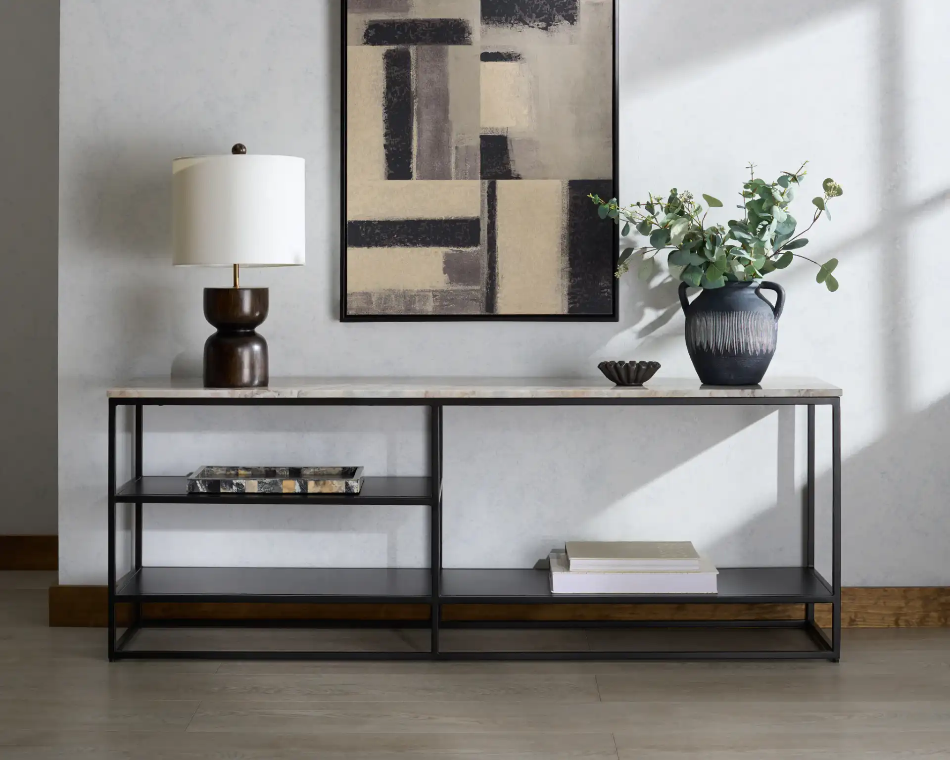 Macklyn Marble Console Table in Light Brown / Black in a styled room