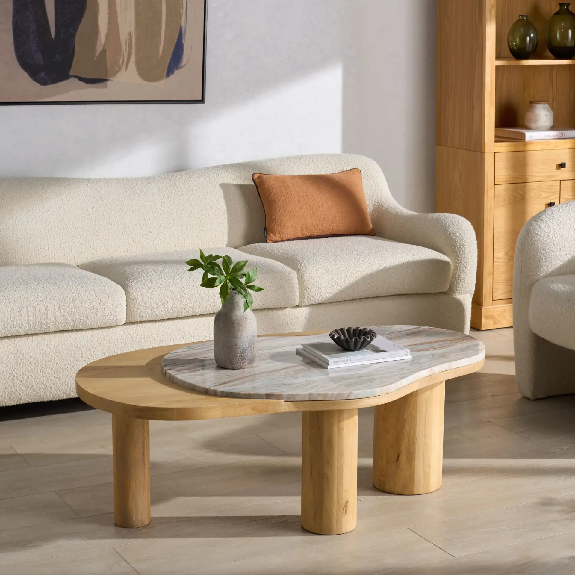 Feliciabeth Marble Coffee Table in Natural / Light Brown in a styled room