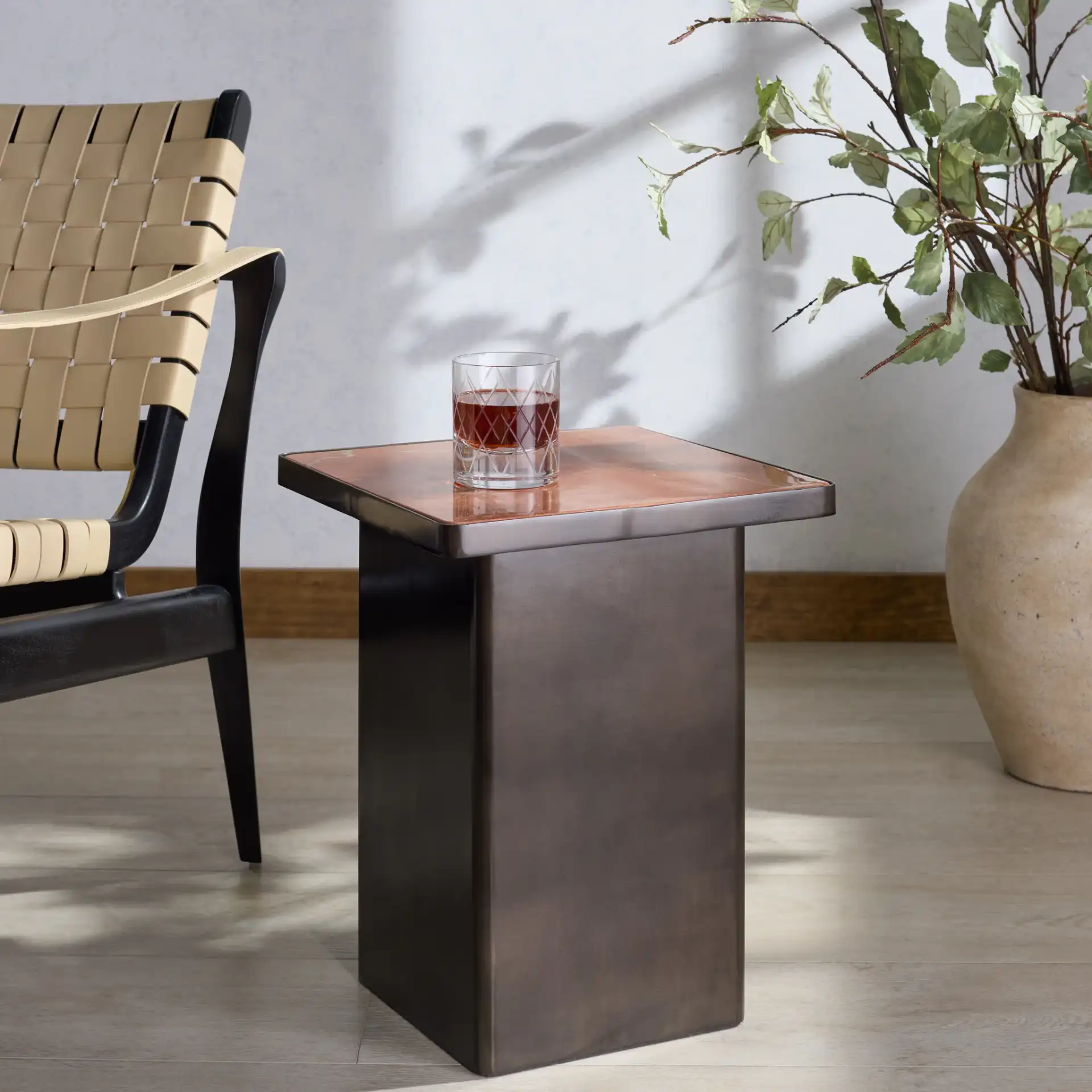 Bellatressa Marble Accent Table in Black / Red in a styled room