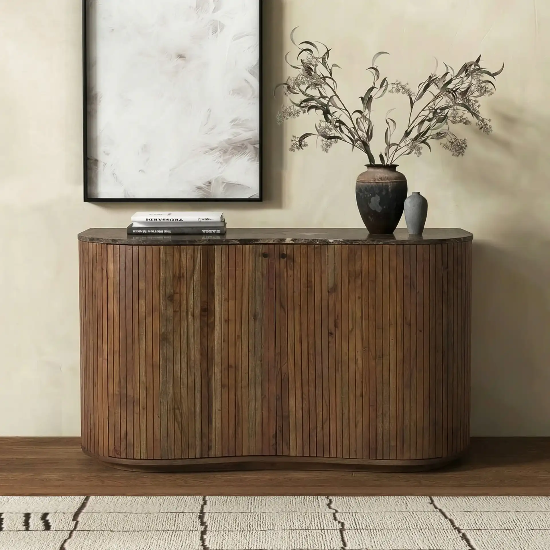 Jamilah Marble Top Chest in Brown in a styled room