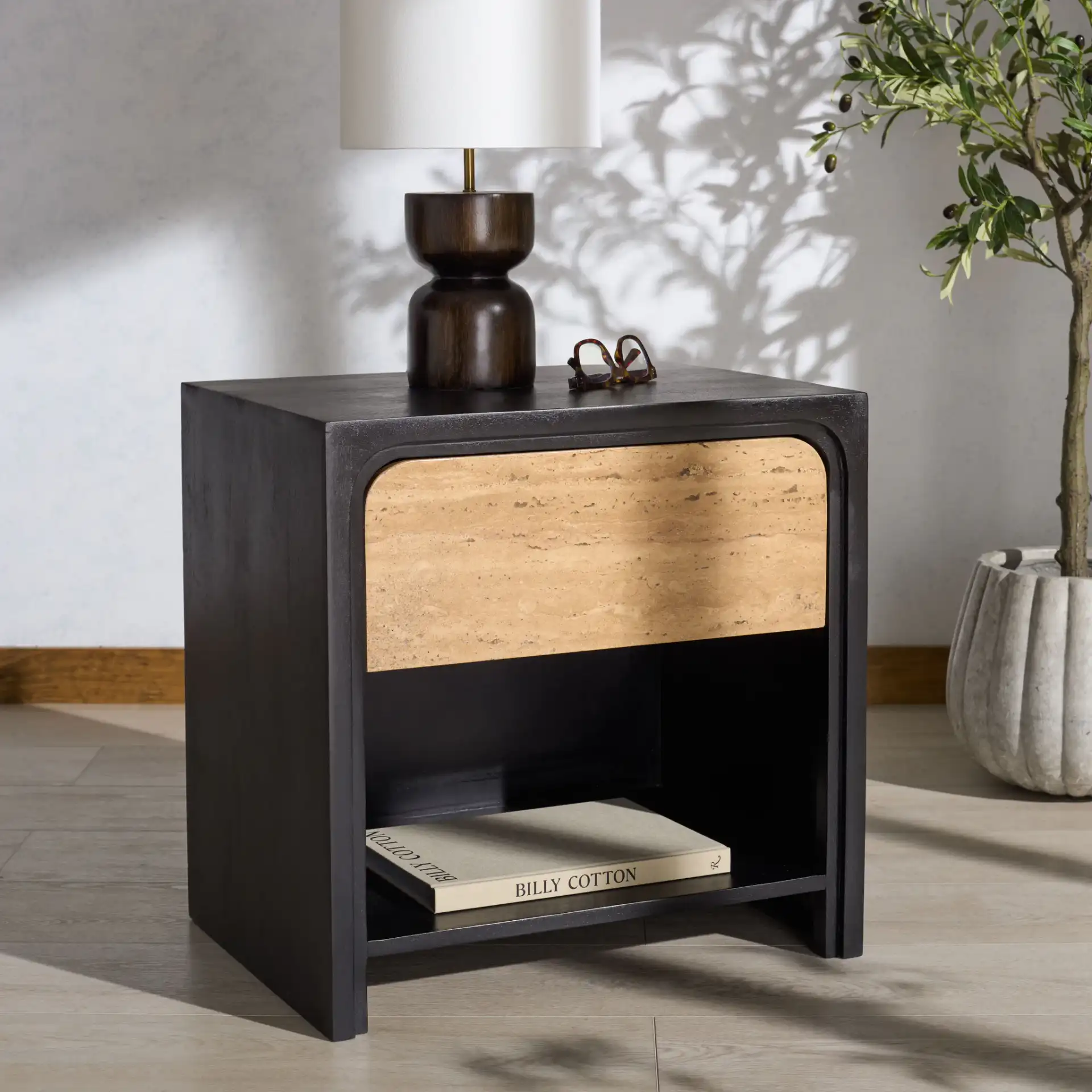 Halcyon Travertine Nightstand in Travertine / Black in a styled room
