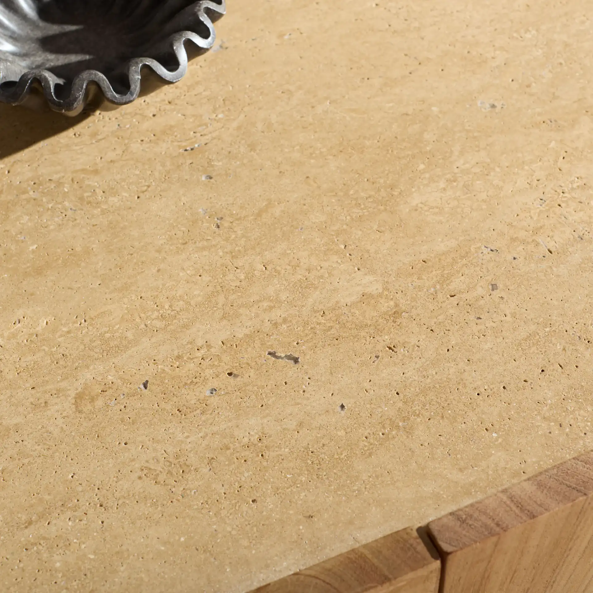Ashlietta Travertine Sideboard in Natural / Travertine in a styled room
