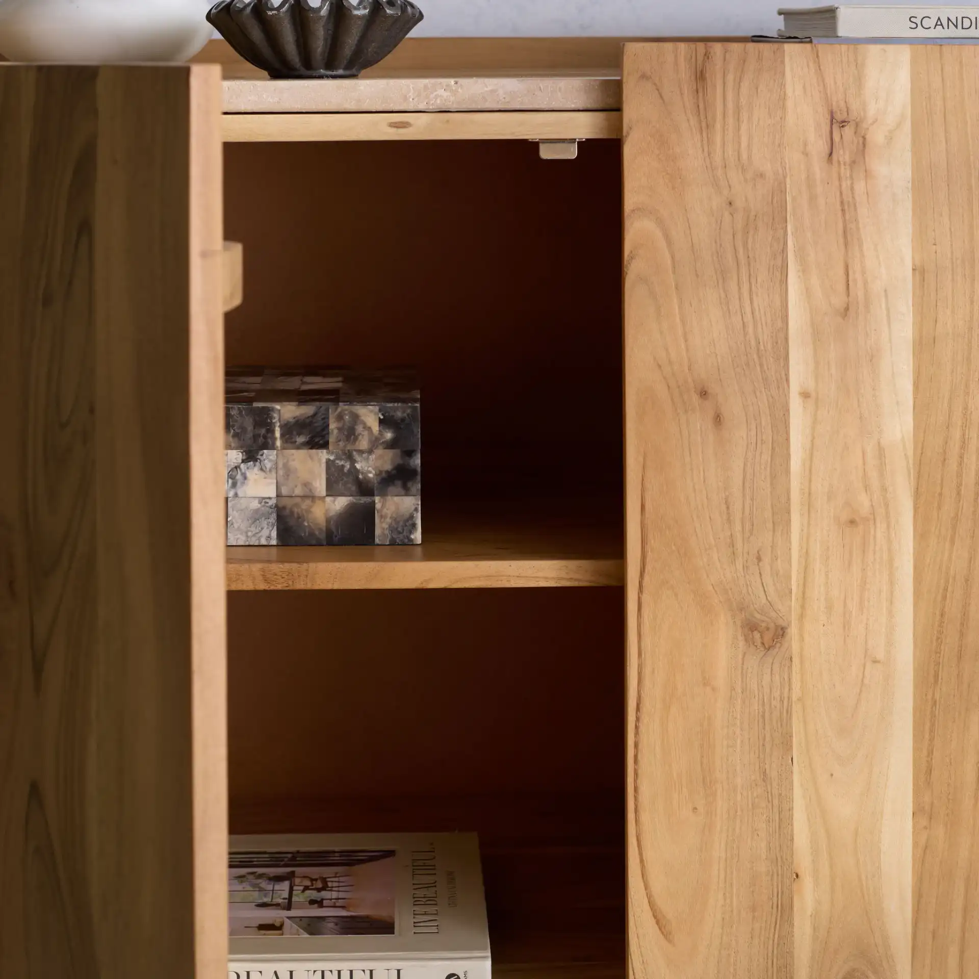 Ashlietta Travertine Sideboard in Natural / Travertine in a styled room