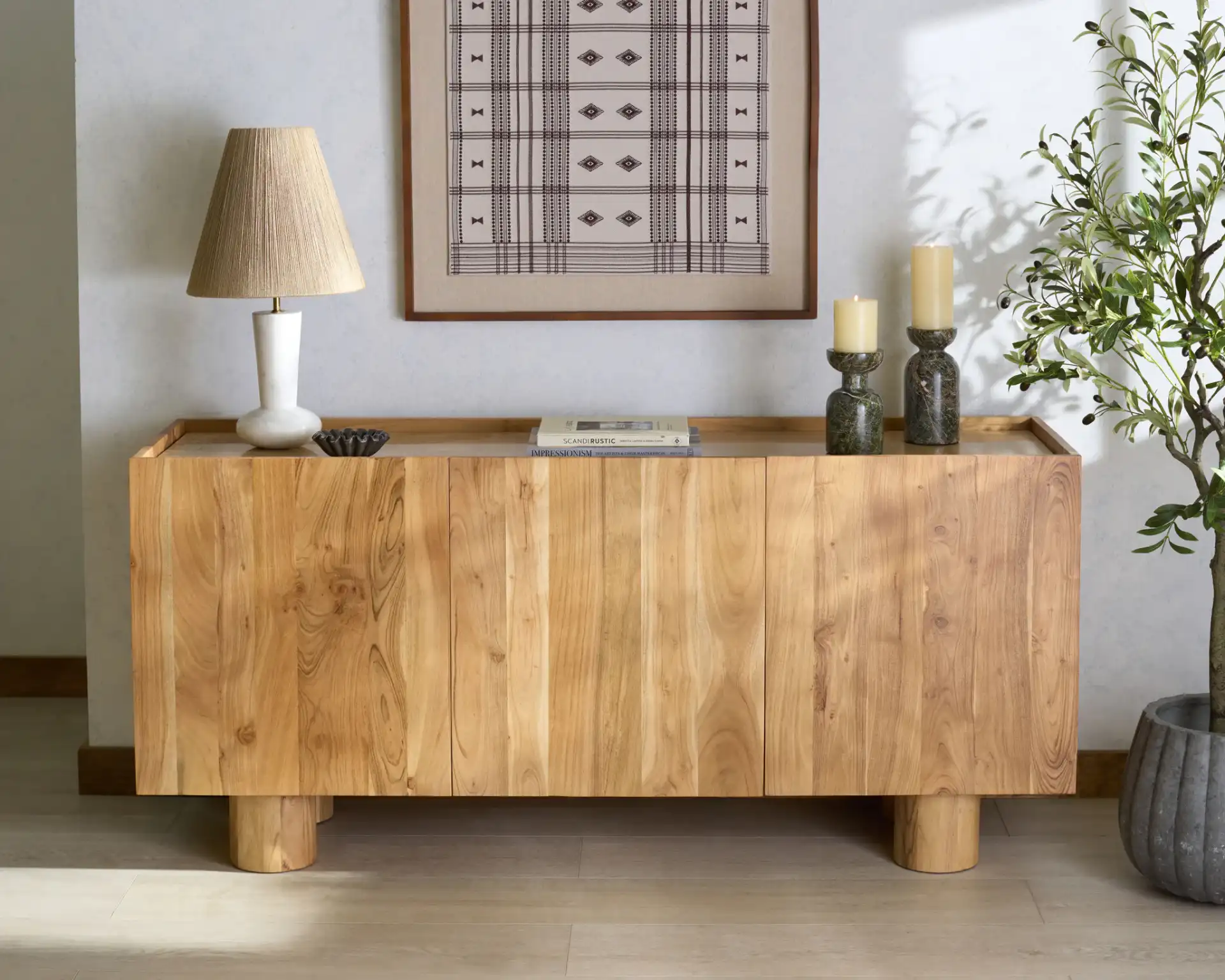 Ashlietta Travertine Sideboard in Natural / Travertine in a styled room