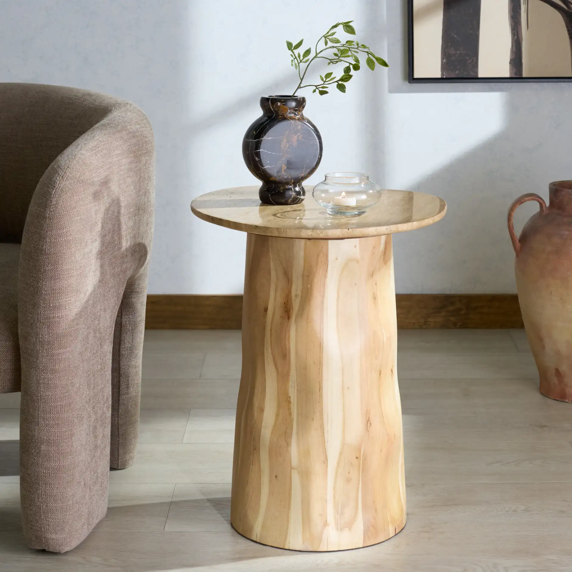 Jennamira Travertine Accent Table in Natural / Travertine in a styled room