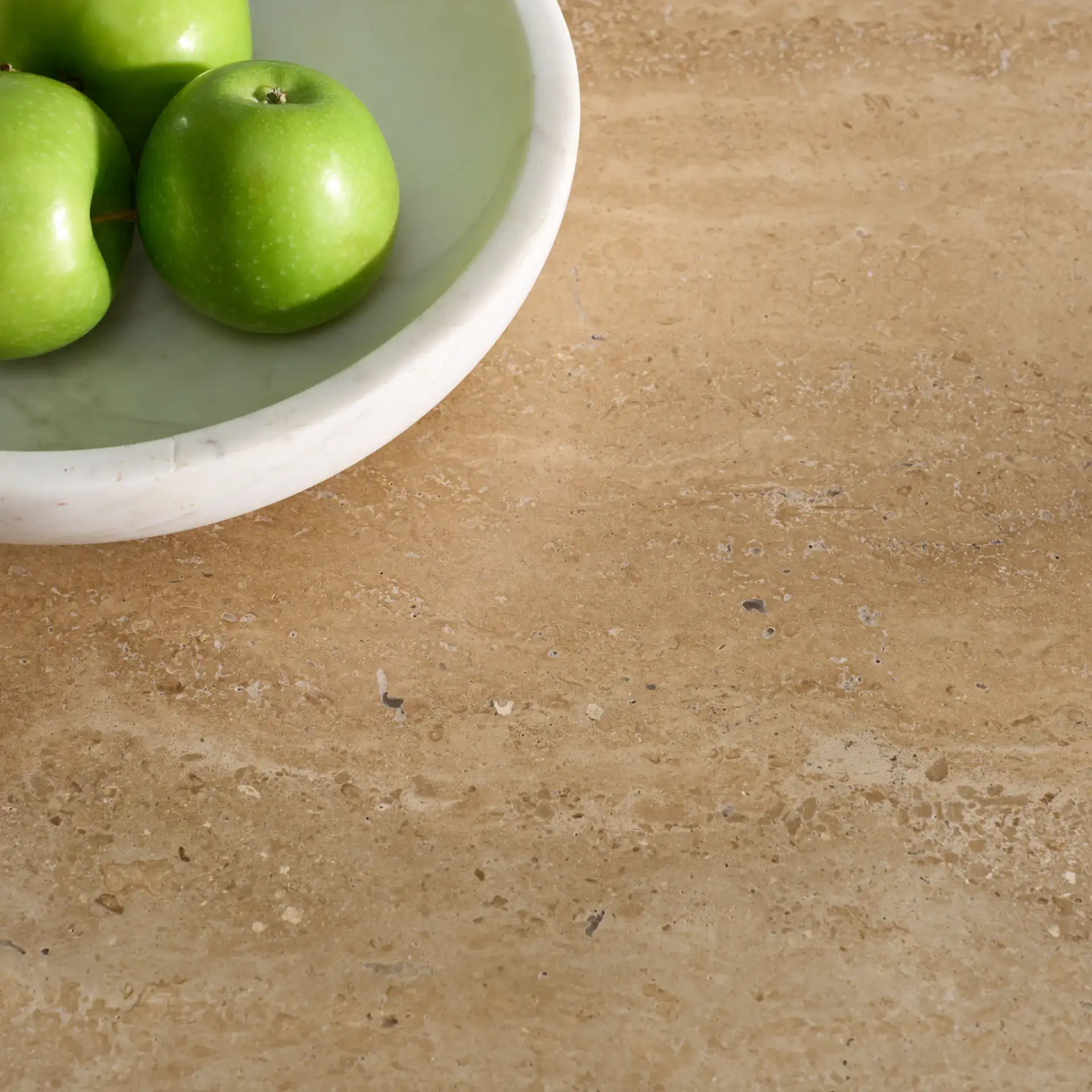 Irine Travertine Dining Table in Travertine / Brown in a styled room
