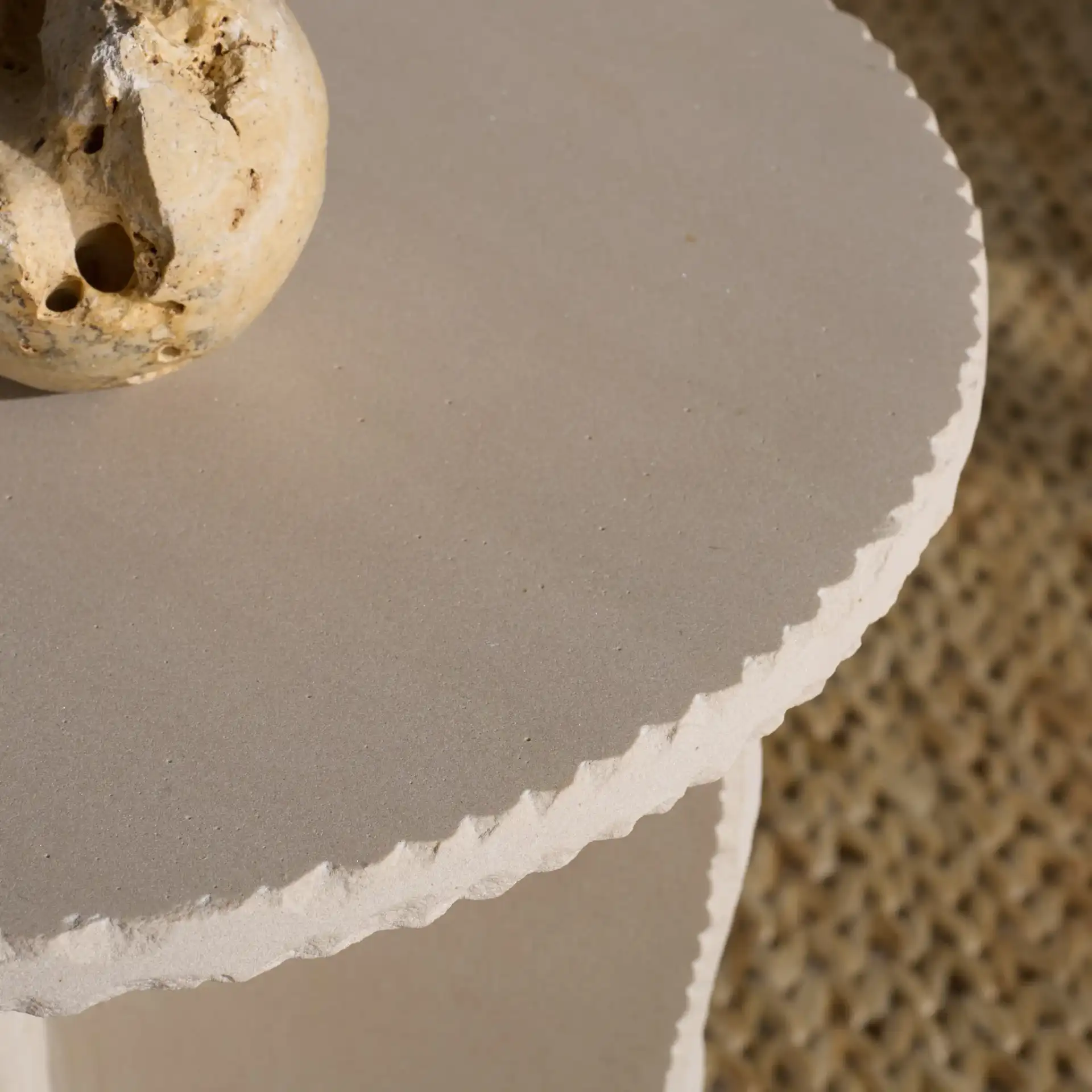 Raybrook Stone Accent Table in Off-White in a styled room