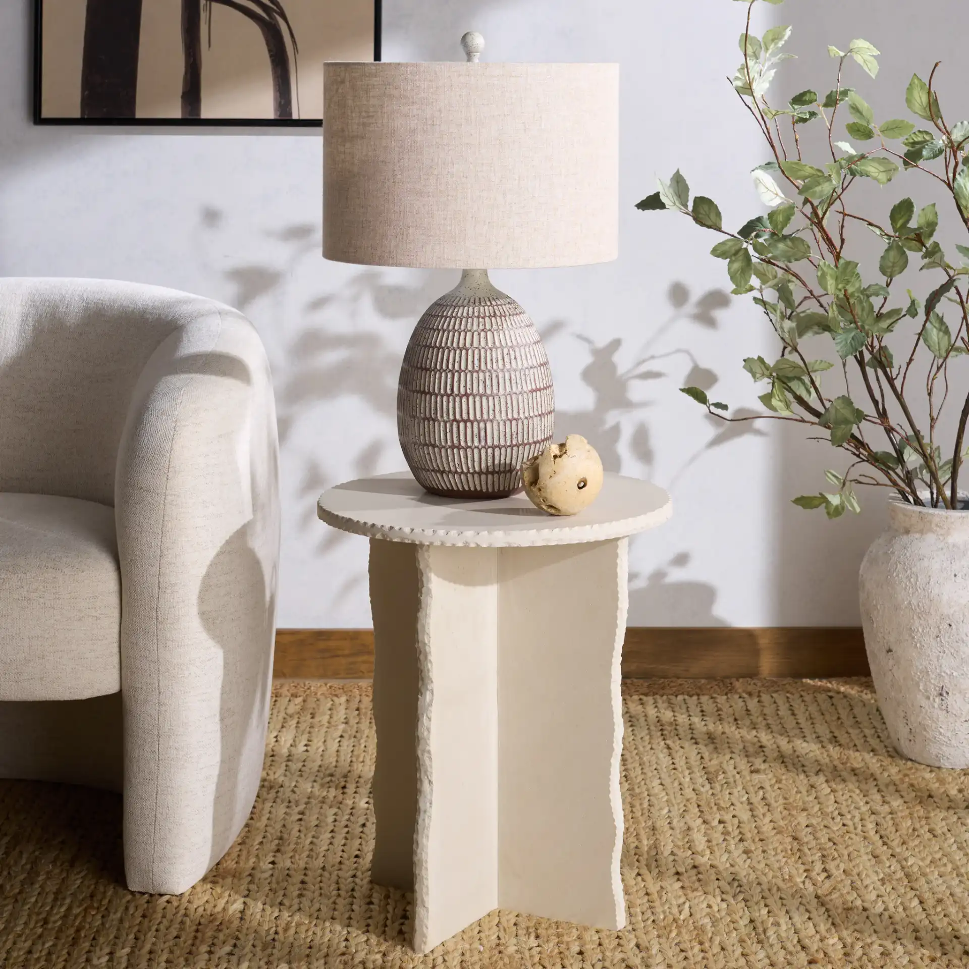Raybrook Stone Accent Table in Off-White in a styled room