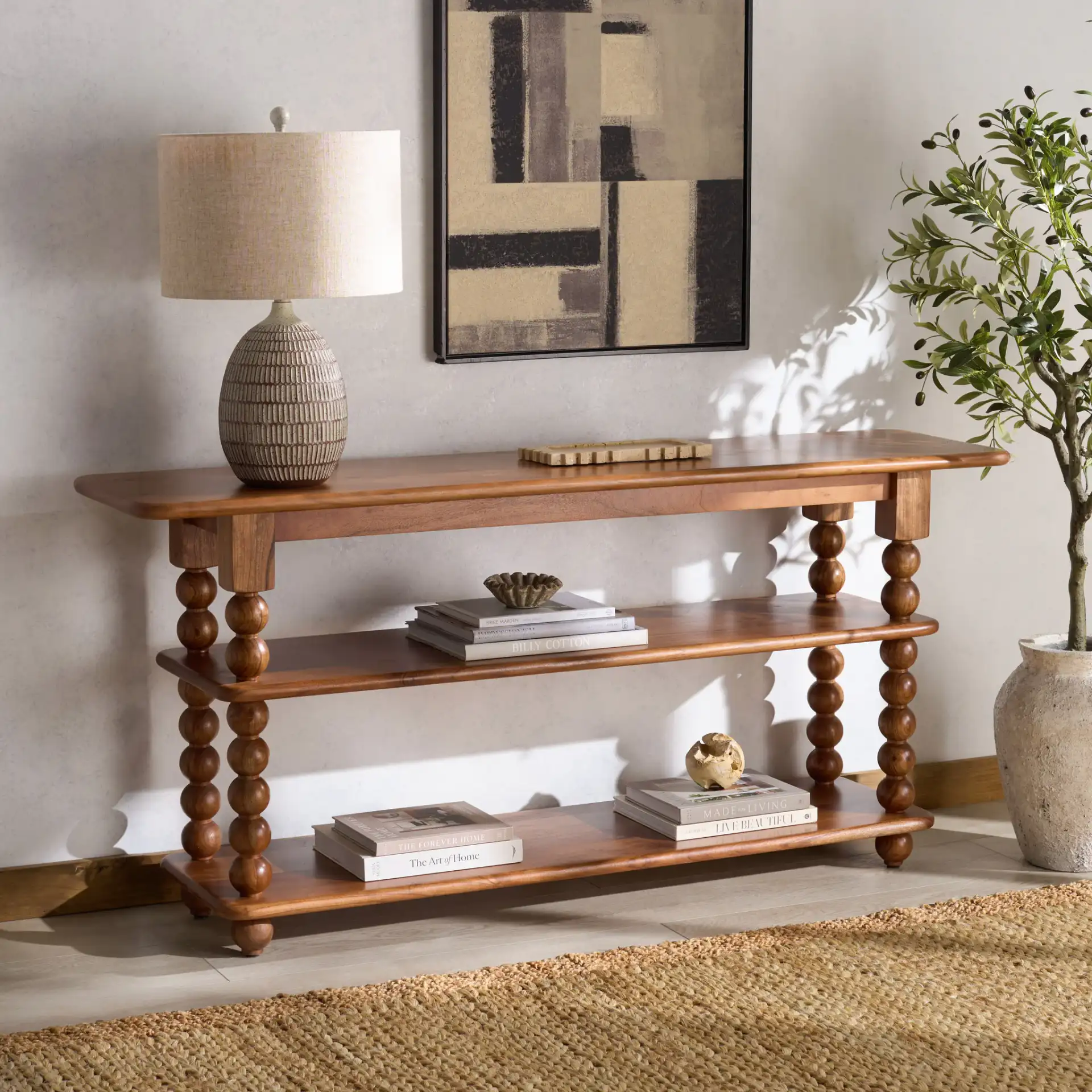 Norbert Wood Console Table in Brown in a styled room